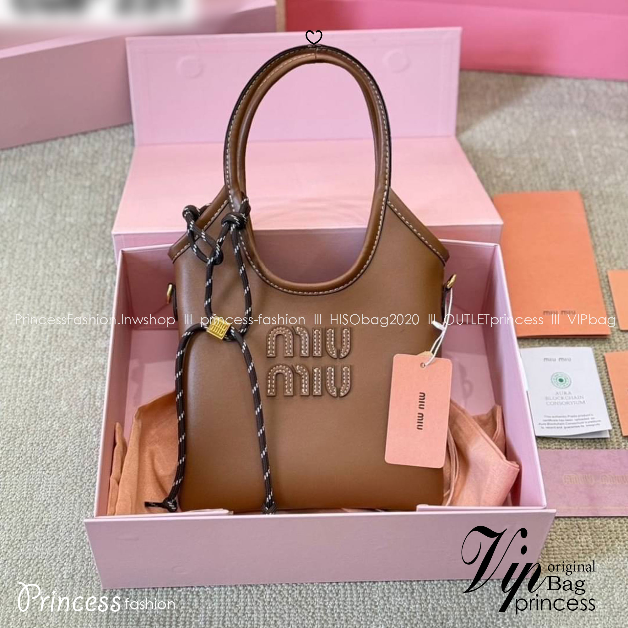 MIU MIU IVY leather handbag กระเป๋าถือทรงโท้ทงานหนังเรียบเต็มใบ ไซส์มินิมีความยูนิค พร้อมเชือกสุดคิ้ว ภายในเป็นช่องโล่ง ใส่ของสำคัญได้ พกพาไปไหนก็ได้