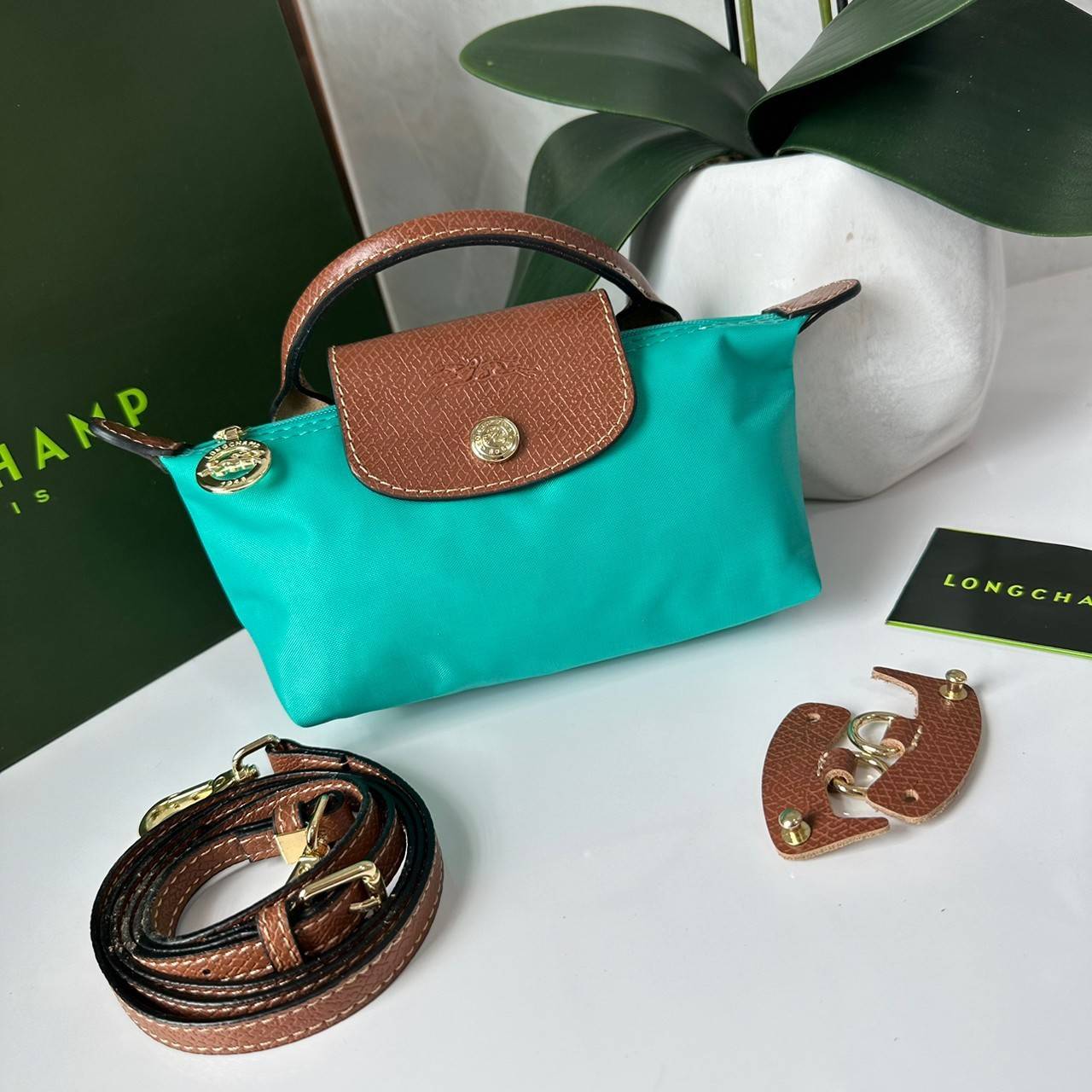 LONGCHAMP LE PLIAGE ORIGINAL Pouch with handle กระเป๋าใบเล็กขนาดกระทัดเหมาะกับใส่ของจำเป็นจุกจิก กันน้ำได้ พร้อมส่ง