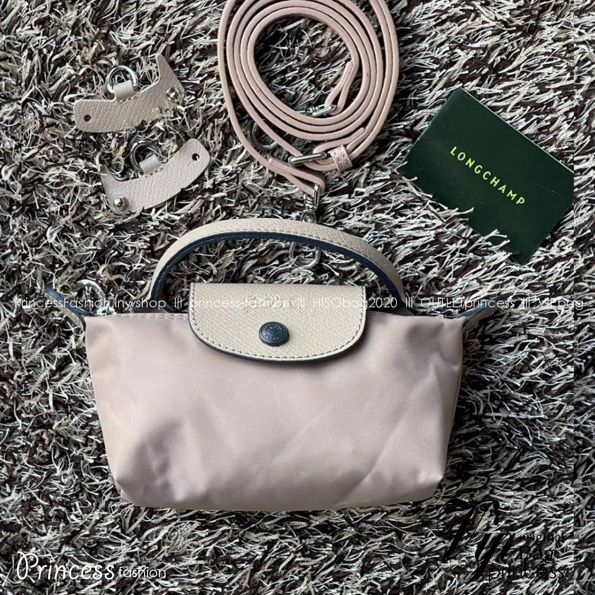LONGCHAMP LE PLIAGE ORIGINAL Pouch with handle กระเป๋าถือขนาดมินิทรงpouch ให้ความหรูหราจาก Le Pliage (เลอ ปลิยาจ) ในขณะที่ที่ปิดแบบซิปช่วยให้คุณมั่นใจได้