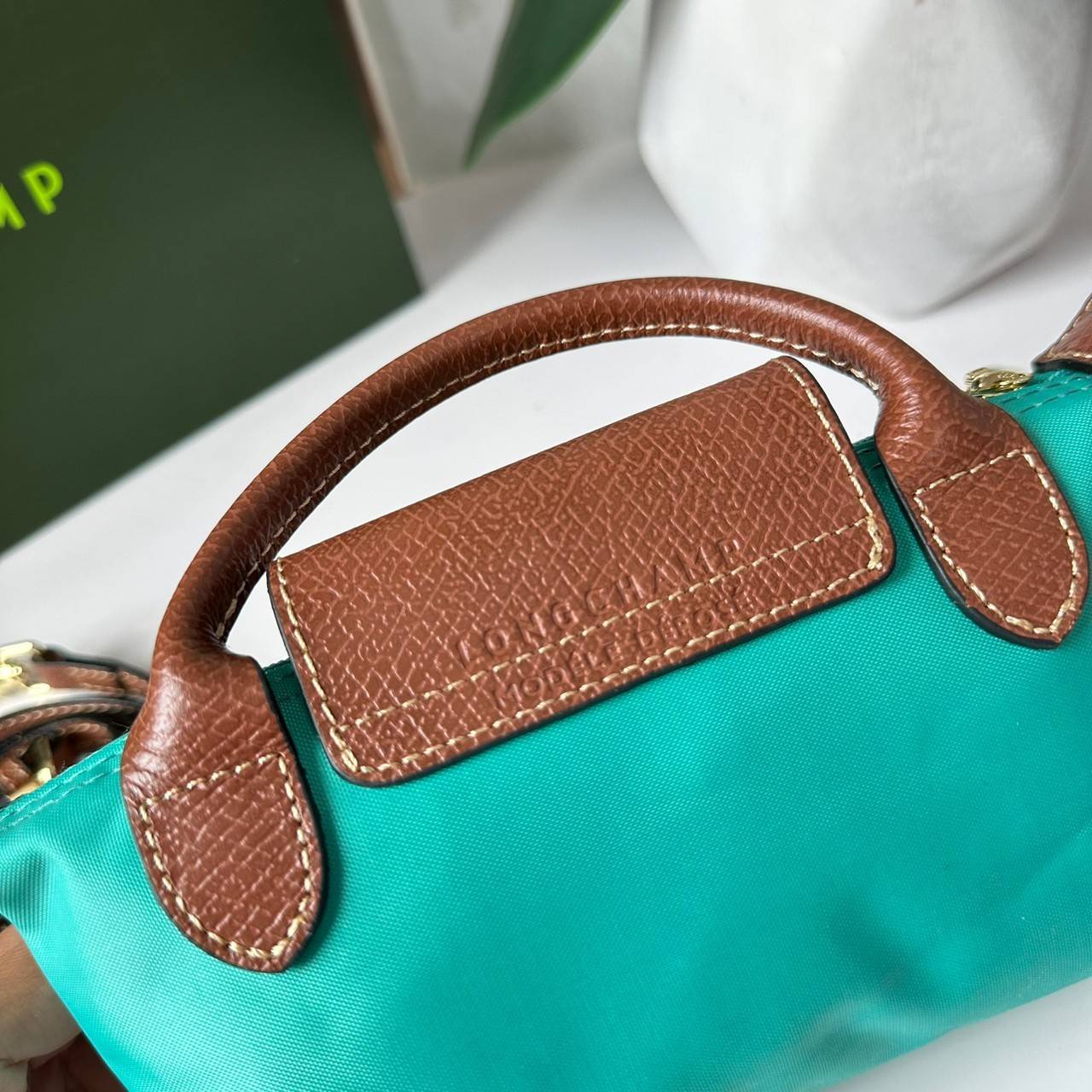 LONGCHAMP LE PLIAGE ORIGINAL Pouch with handle กระเป๋าใบเล็กขนาดกระทัดเหมาะกับใส่ของจำเป็นจุกจิก กันน้ำได้ พร้อมส่ง