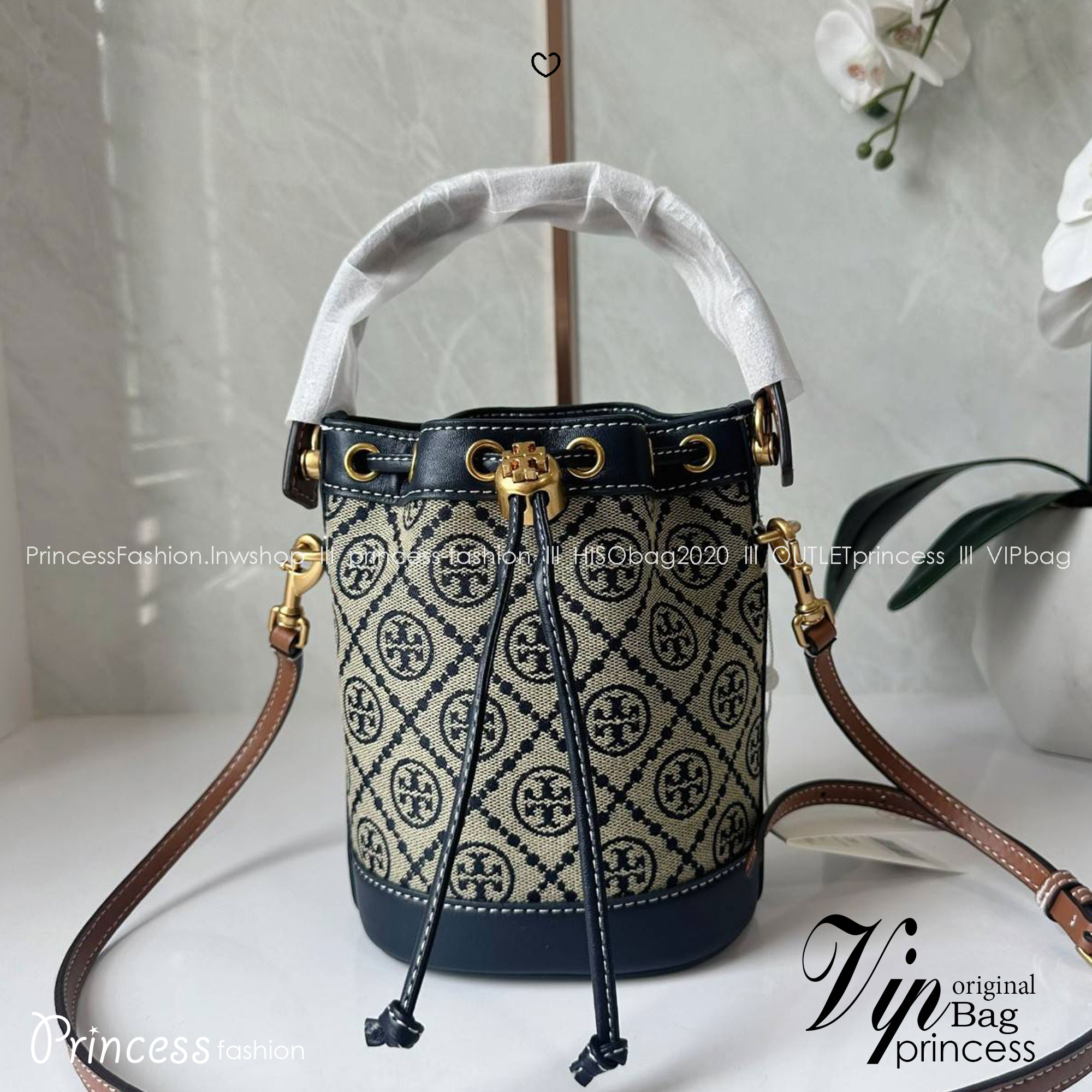 TORY BURCH T MONOGRAM JACQUARD MINI BUCKET BAG กระเป๋าทรงบัคเก็ตไซส์มินิ ทรงยอดนิยมขนาดน่ารัก