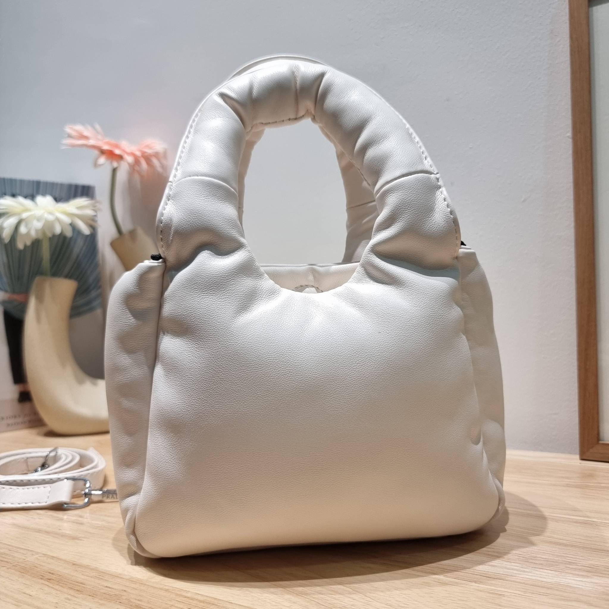 PRADA Small padded Soft nappa-leather bag พร้อมส่ง 4 สี น้องใหม่ล่าสุด กับคอลเลคชั่นที่ทำออกมาตอบโจทย์ได้ทุกไลฟ์สไตล์