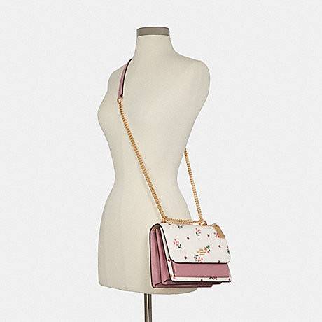 COACH C7596 KLARE CROSSBODY WITH HEART PETAL PRINT หนึ่งคอลเลคชั่นที่ฮิตไม่หยุดยั้ง!! ขายดิบขายดีทุกดีไซน์ รอบนี้มาตอบโจทย์สายหวาน ใหม่ล่าสุด น้องน่ารักม้ากกกก!! กับกระเป๋าสะพายข้าง โทนสีละมุนลูกคุณ!! คือดี!! เพิ่มลูกเล่นช่อดอกไม้หัวใจ ให้มีสีสัน สายสะพาย