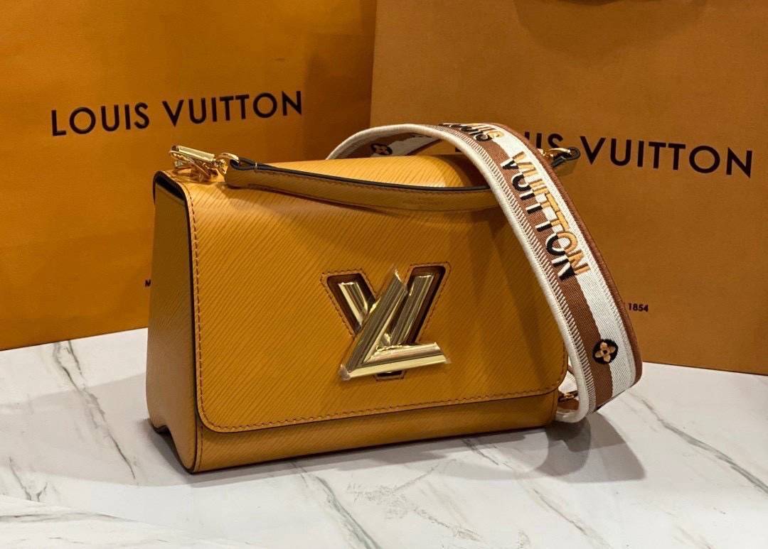 ORI หนังแท้ | LV Twist MM bag Epi grain leather กระเป๋าสะพาย/กระเป๋าถือรุ่น พร้อมสายสปอร์ต หนังลายเกรน Epi โดดเด่นด้วยโลโก้หน้า สวยหรูเป็นเอกลักษณ์ ดีไซน์คัลเลอร์บล็อค สัมผัสโดดเด่นแมตช์กับทุกสไตล์