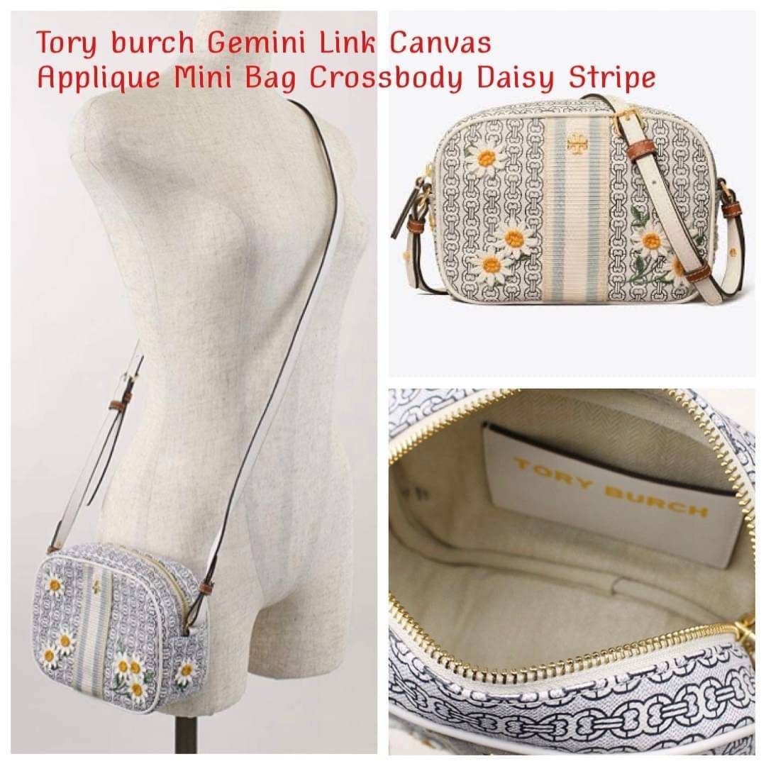 Tory burch Gemini Link Canvas Applique Mini Bag Crossbody Daisy Stripe กระเป๋าสุดปังจากทอรี่ เบริช์(Tory Burch) อย่างเจมิไนลิงค์ ในทรงcrossbody bag มีเอกลักษณ์โดดเด่นที่ลายทางตรงกลาง มีการพิมพ์แพทเทิรน์โซ่แบบเรียบหรู เพิ่มความน่ารักจากดอกเดรซี่ที่ถูกจัดวา