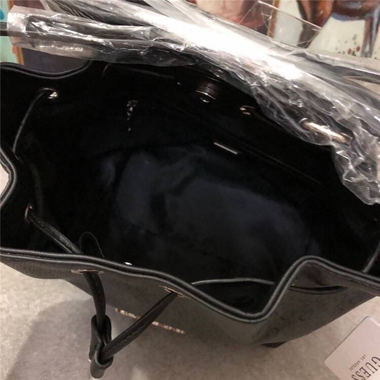 Guess Muze Logo Bucket Bag Adjustable crossbody กระเป๋าสะพายทรงขนมจีบ