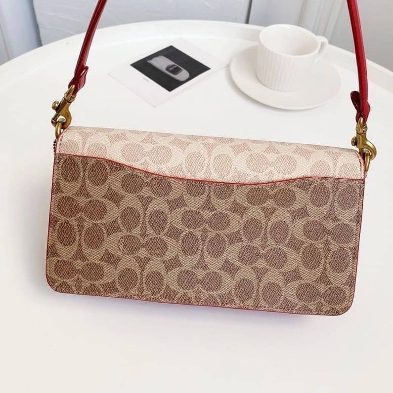 Coach Tabby Shoulder Bag 26 Polished pebble leather, suede and refined calf leather Inside zip and multifunction pockets