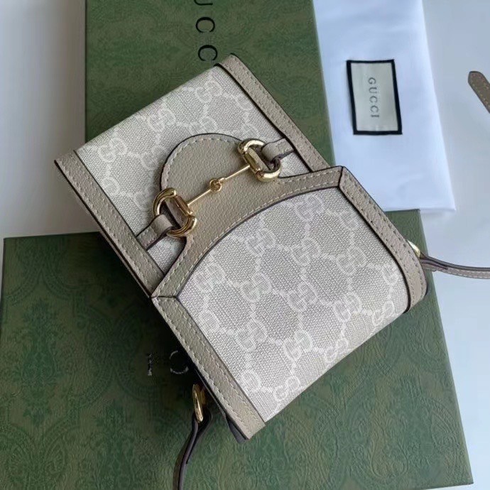 Gucci Horsebit 1955 mini bag / Gucci Phone Bag เกรดใช้งานสลับใบจริงได้ ออริจินอล รุ่นยอดฮิต ไซส์มินิ ที่ใครๆก็ต้องรู้จัก!! กับกระเป๋าขนาดมินิ ได้รับแรงบันดาลใจมาจากดีไซน์ดั้งเดิม ซึ่งแอคเซสเซอรี่นี้โดดเด่นด้วยรายละเอียดดั้งเดิมที่ทันสมัยโดยเน้นที่ฮอร์สบิต