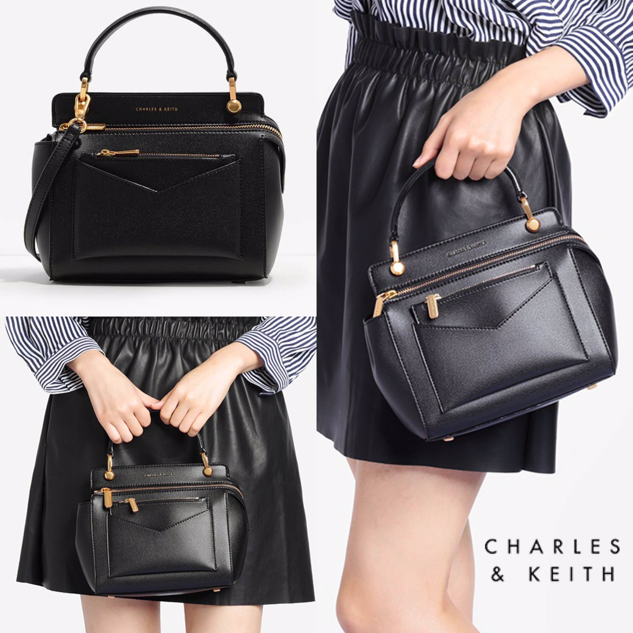CHARLES & KEITH MINI TOP HANDLE BAG กระเป๋าถือหรือสะพายรุ่นยอดนิยมวัสดุหนังคาเวียร์ดีไซน์สวย อยู่ทรง ด้านหน้ามีช่องใส่ของพร้อมกระเป๋าคลัชเข้าชุดอีก1ใบ สามารถถอดแยกใช้ได้ มาพร้อมหูจับและสายสะพายยาวถอดได้ปรับระดับได้เปิดปิดด้วยซิป หัวซิปปั้มโลโก้ น้ำหนักเบา