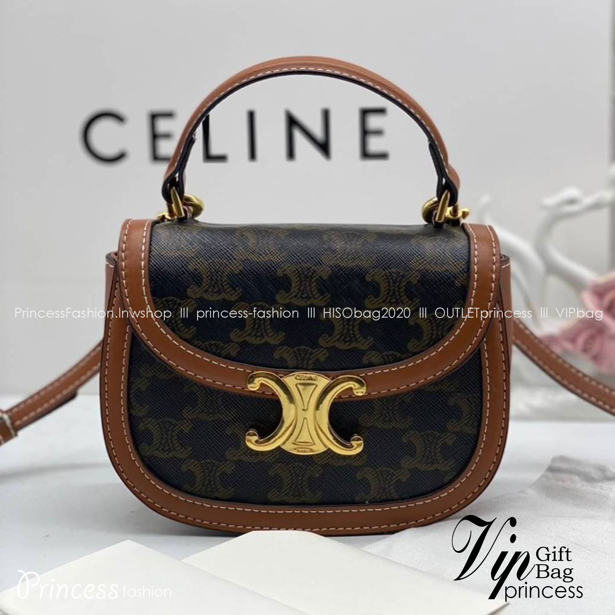 CELINE Mini besace triomphe in shiny top handle กระเป๋าสะพายคาดลำตัวพร้อมหูจับถนัดมือ ได้รับความนิยมอย่างมาก ด้วยรูปร่างทรงโค้งมนมีความคลาสสิกตามแบบฉบับแบรนด์
