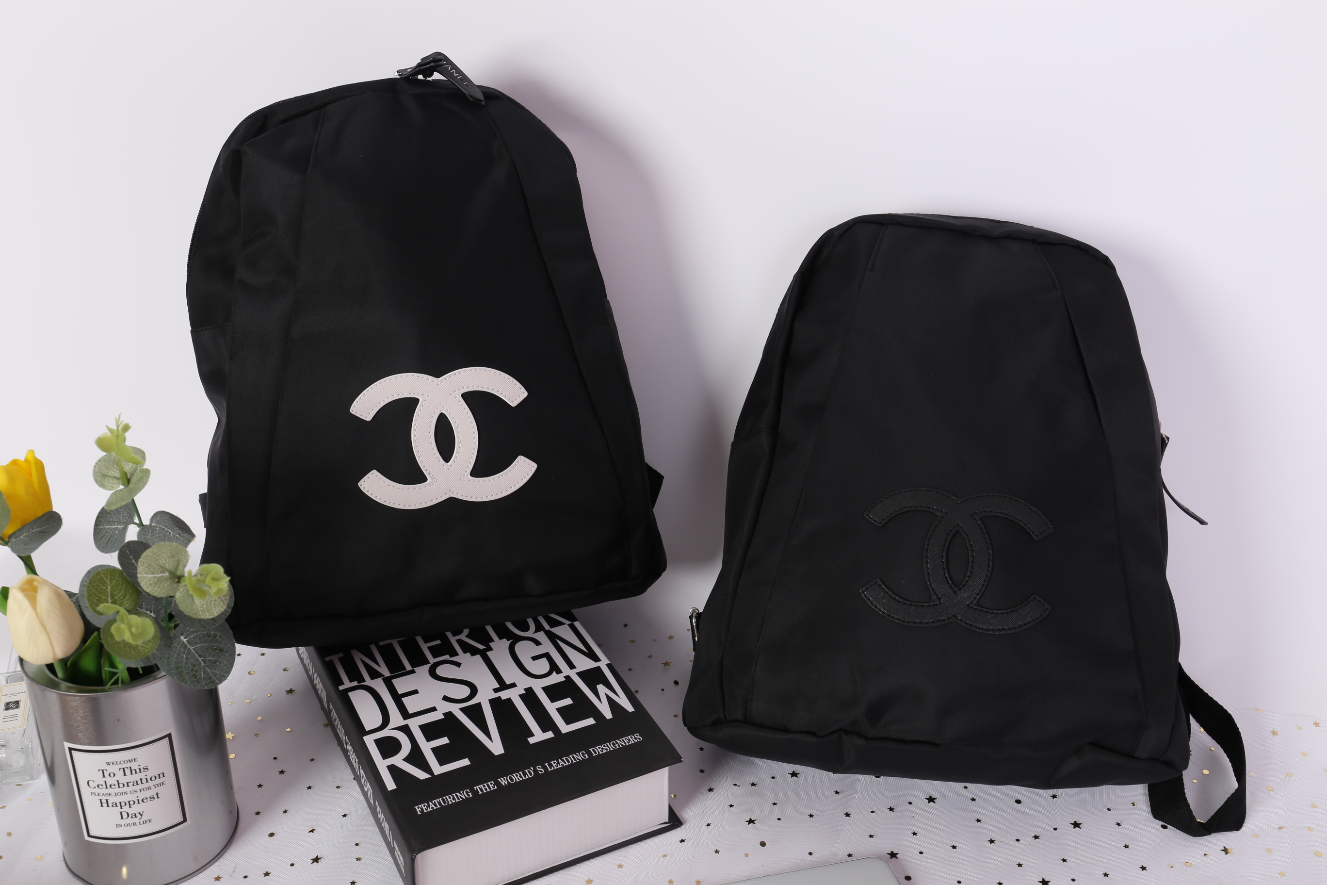CHANEL VIP GIFT NYLON BACKPACK กระเป๋าเป้ Limited Edition VIP Gift With Purchase (GWP) ของเเท้จาก Chanel Perfumes Counter วัสดุ NYLON เนื้อหนาสีดำตัดโลโก้แบรนด์สีขาว เปิดปิดด้วยซิป หัวซิปแบรนด์ ขนาดกำลังดี น้ำหนักเบา กันนำ้ดูแลรักษาทำความสะอาดง่าย มีหูหิ้