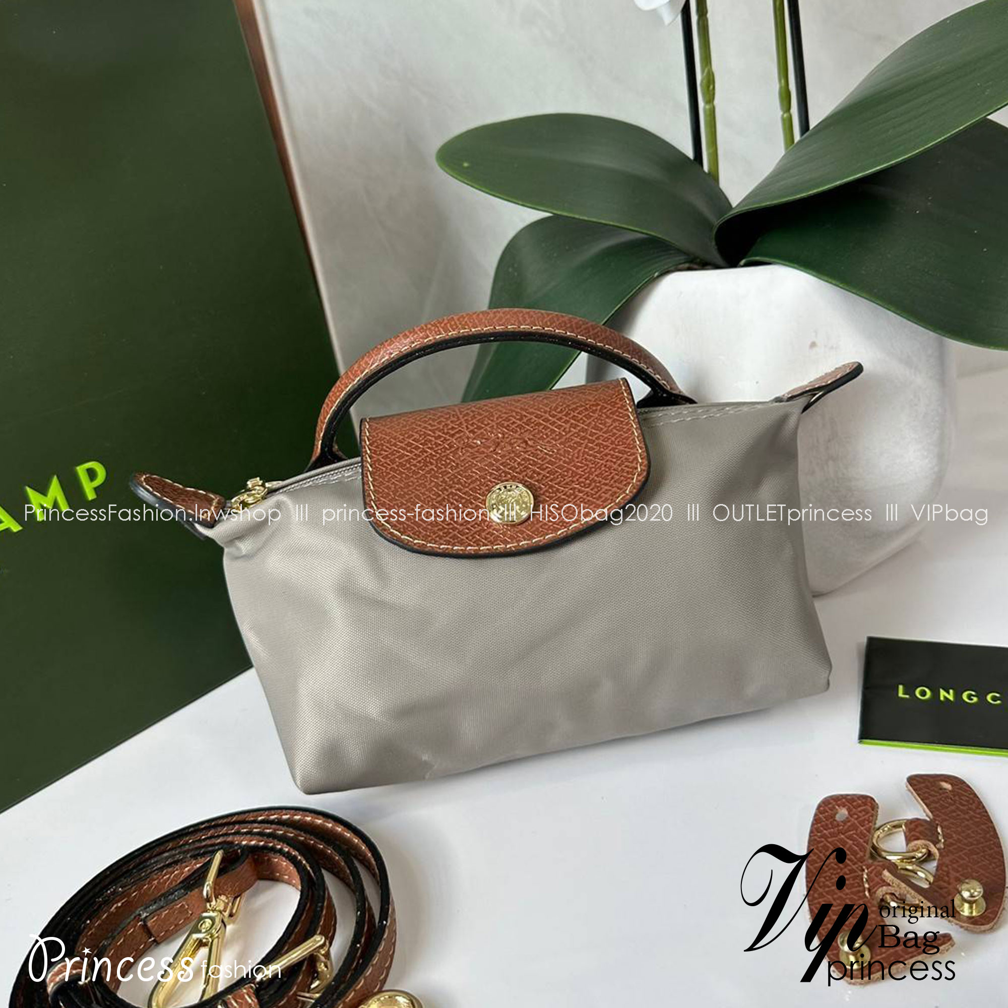 LONGCHAMP LE PLIAGE ORIGINAL Pouch with handle กระเป๋าใบเล็กขนาดกระทัดเหมาะกับใส่ของจำเป็นจุกจิก กันน้ำได้ พร้อมส่ง