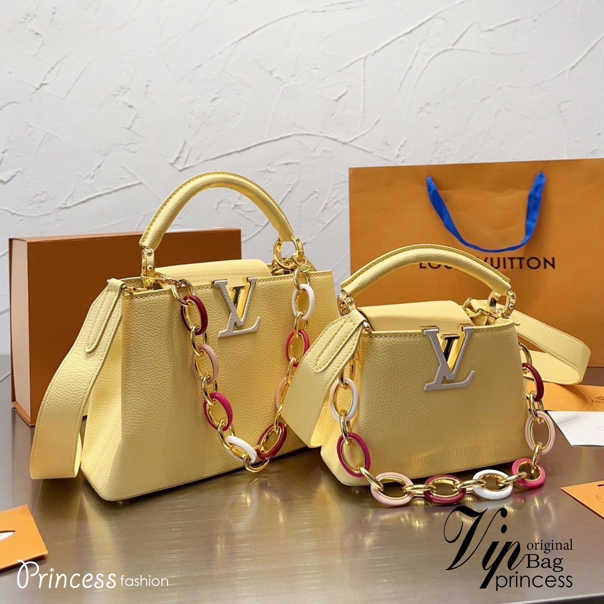 LV Capucines BB MM top handle with a multicolored chain on which gold-color links alternate / LV BAG พร้อมส่ง 2 ไซส์ ที่สุดของความสวยในราคาเบาๆ กระเป๋าถือสุดหรู ดีไซน์ทรงคลาสสิค พร้อมสายโซ่อะไหล่ทองหลากสีหรูหรา