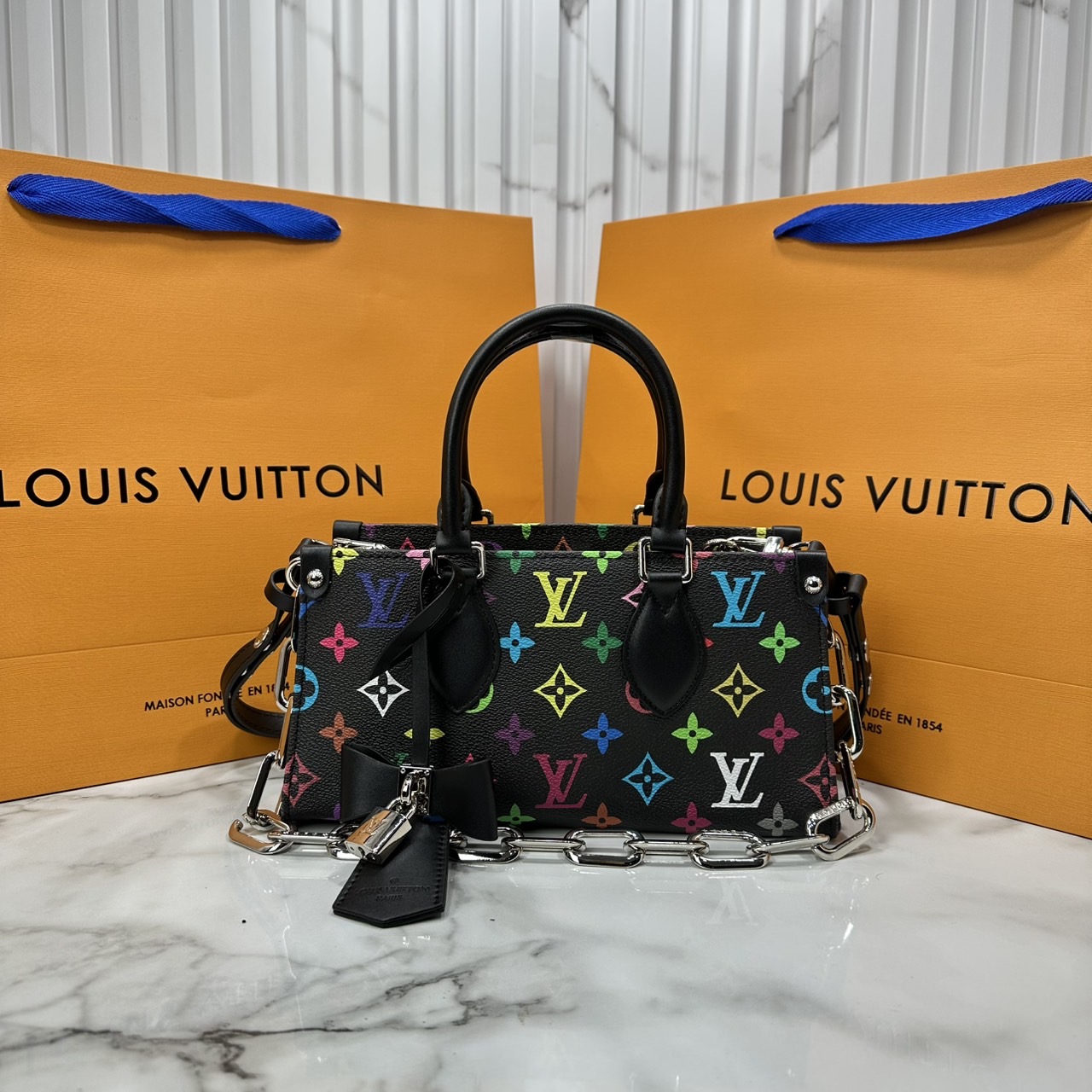ORI หนังแท้ | LV x TM bolsa OnTheGo East West Multicolor กระเป๋าสะพายทรงโท้ทที่ใครเห็นต้องเป็นหลงรัก คอลใหม่ดีไซน์เฉดสีสันสดใส