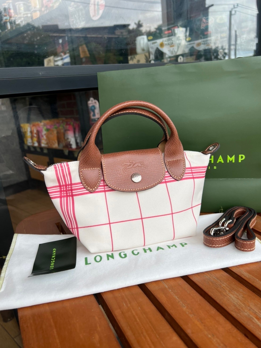 LONGCHAMP LE PLIAGE TORCHON Top handle bag - Red กระเป๋าถือขนาดเล็ก วัสดุผ้าฝ้าย อะไหลเงิน ตัดแต่งด้วยหนังวัวแท้ ผสมผสานแนวคลาสสิกแบบมินิมอลศิลปะการพับกระดาษแบบญี่ปุ่นดั้งเดิม
