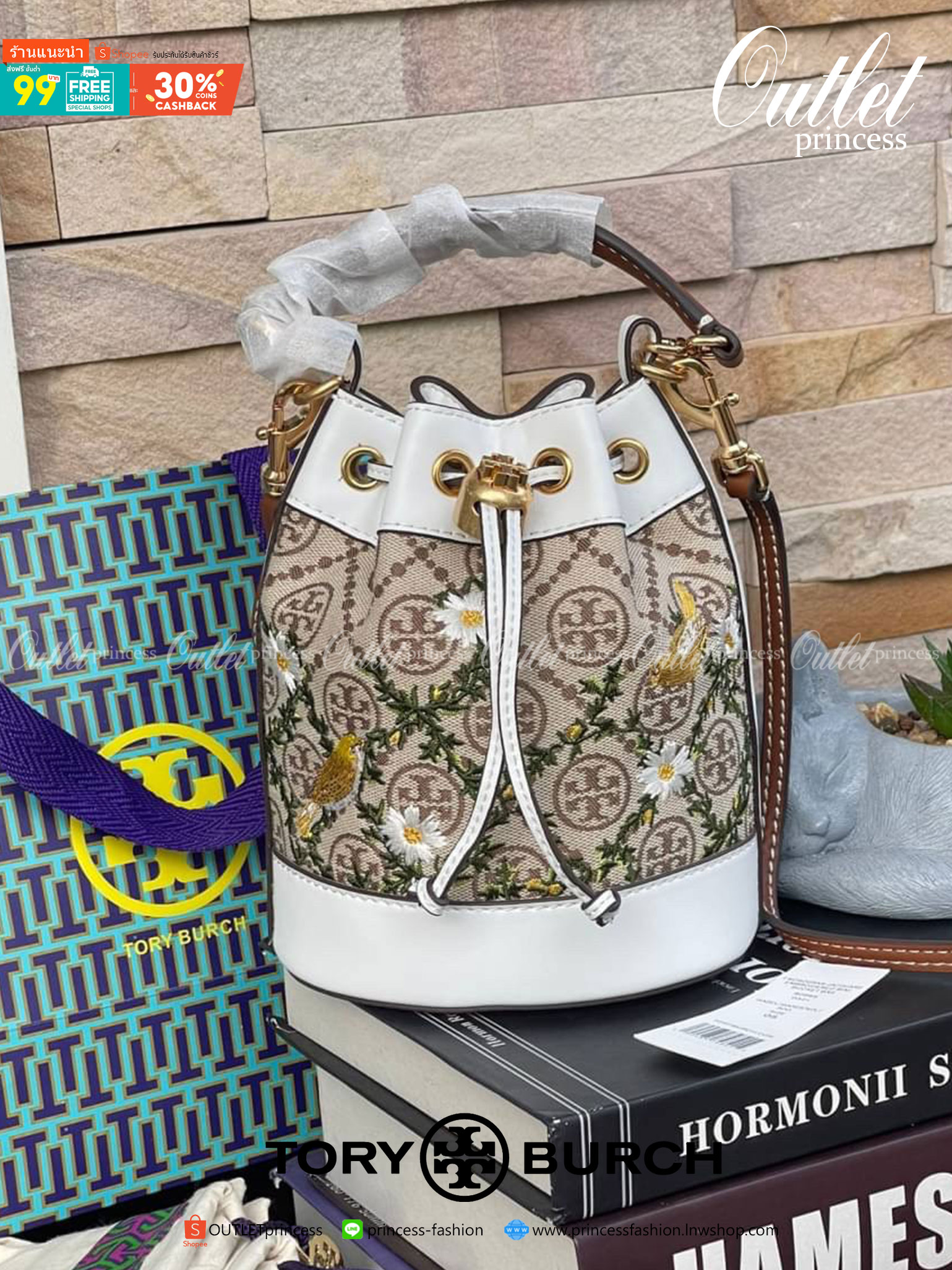 ของแท้ 💯% 】shop Mini : TORY BURCH T MONOGRAM JACQUARD EMBROIDERED MINI BUCKET BAG รุ่นใหม่ล่าสุดจาก TORY BURCH ครั้งแรกกับโมโนแกรม ที่ได้รับแรงบันดาลใจมาจากโลโก้สุดคลาสสิก กลับมาอีกครั้งในรูปแบบของ ลวดลาย T Monogram