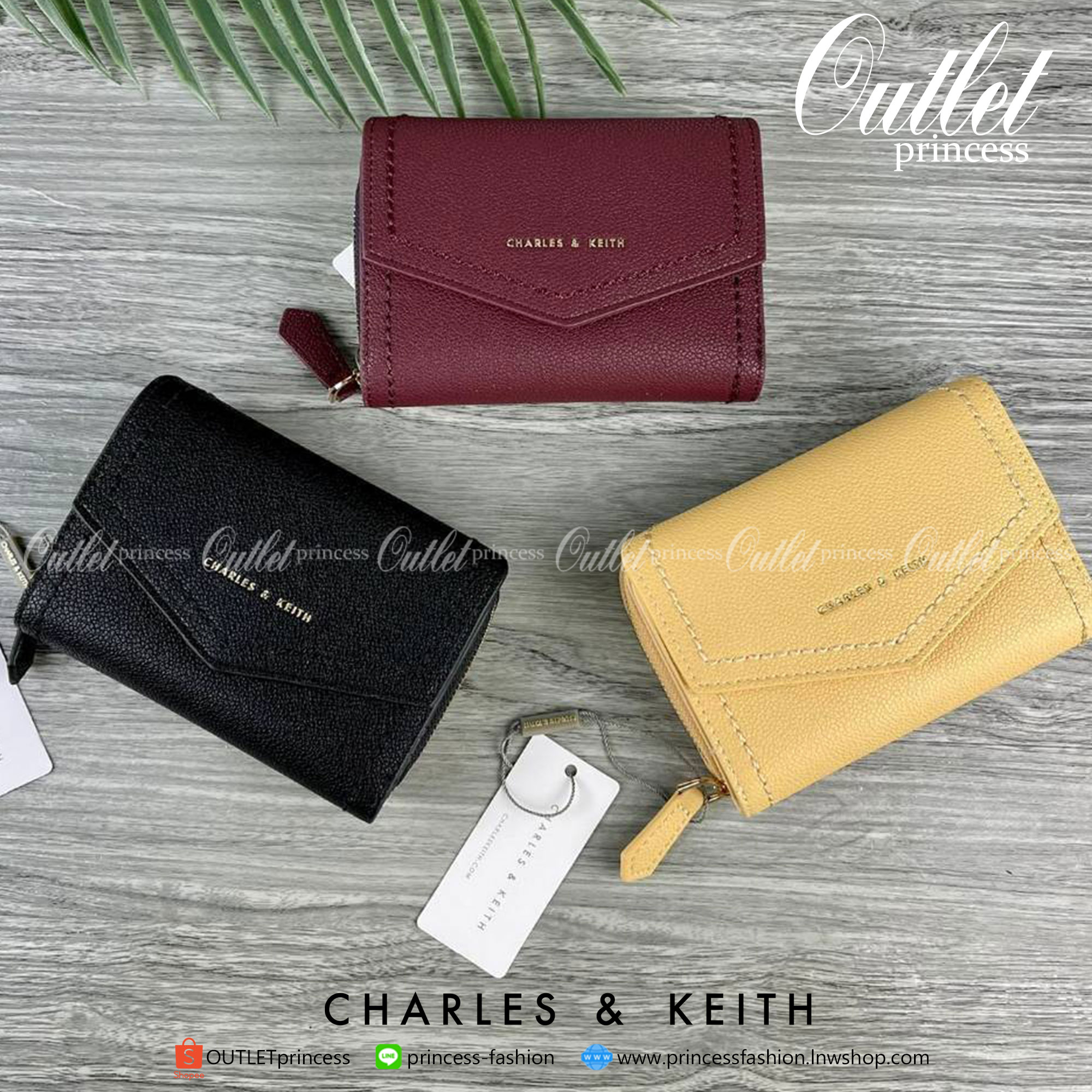 CHARLES & KEITH ENVELOPE SMALL WALLET กระเป๋าเงินใบกลาง วัสดุหนังพิมพ์ลายสีสวยน่ารัก ด้านหน้าปั๊มโลโก้แบรนด์ เปิดปิดด้วยกระดุมแม่เหล็ก
