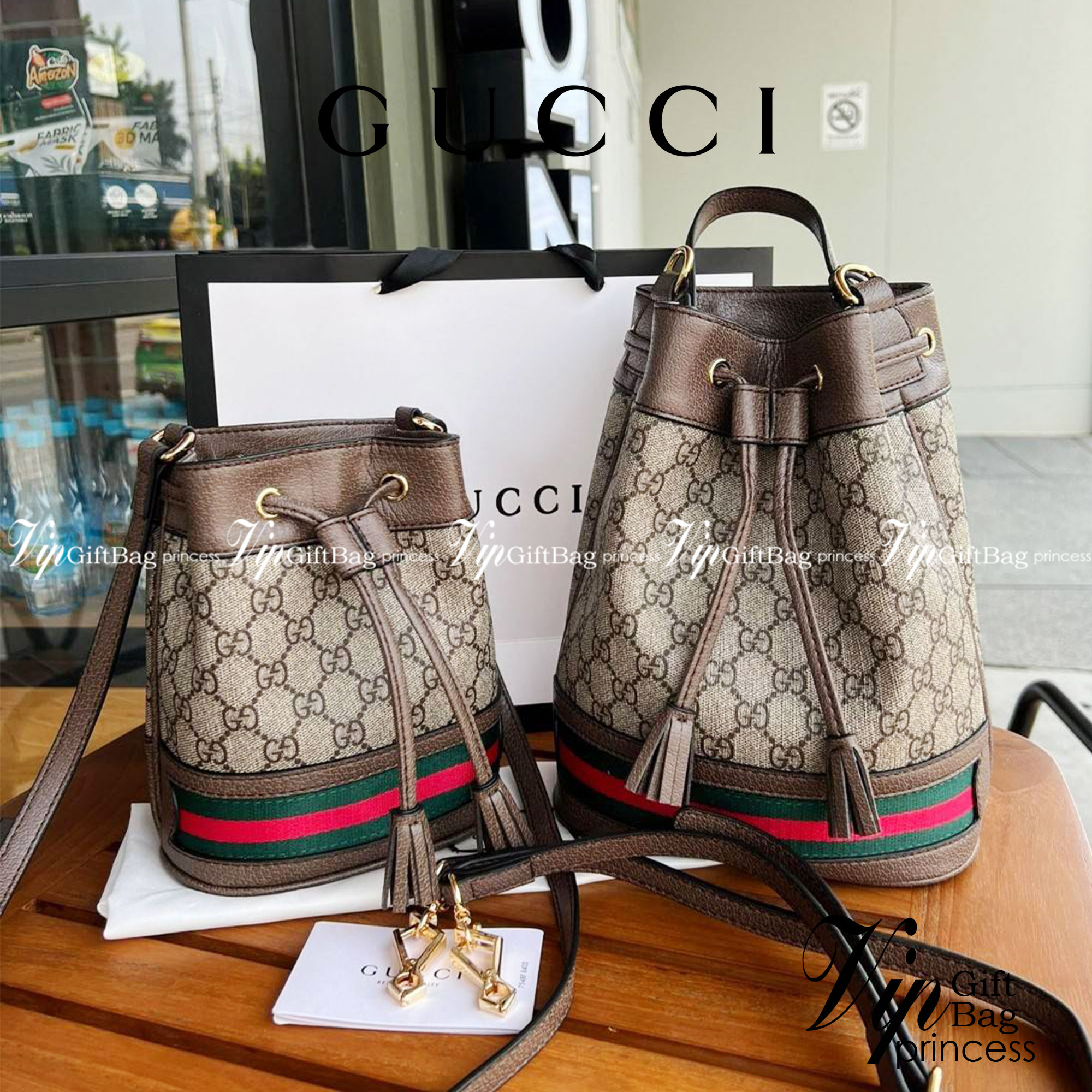 GUCCI Ophidia mini small GG bucket bag กระเป๋าถือหรือสะพายข้าง ขนาดเล็ก ทรงขนมจีบ วัสดุผ้าใบ+หนังแท้ พร้อมแถบลายทางสีเขียวและสีแดงด้านล่าง ด้านในโล่ง มี1ช่องเล็ก สายยาวถอดสายไม่ได้ ปรับระดับได้ ใบนี้เรียบหรูดูดีสุดๆไม่ควรพลาดค่า