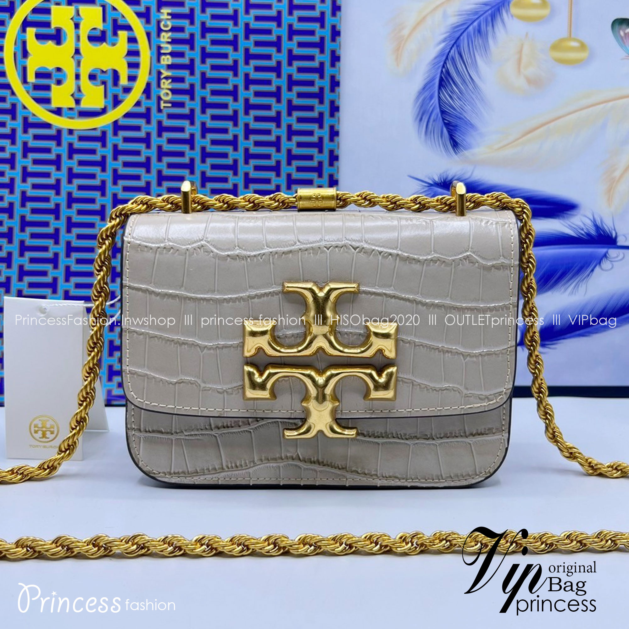 6 สี Tory Burch Croc Eleanor Small Bag / TORY BURCH ELEANOR CROC EMBOSSED LEATHER กระเป๋าสะพายหนังพิมพ์ลายจระเข้ ดีไซน์หรูหรา โด่นเด่นด้วยโลโก้แบรนด์อะไหล่ด้านหน้า และสายสะพายโลหะสีทอง