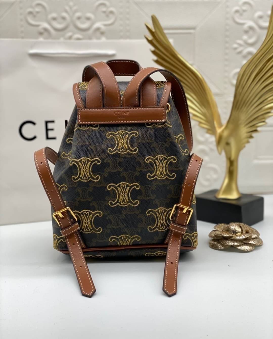 Celine Backpack / CELINE MINI BACKPACK FOLCO in TRIOMPHE CANVAS WITH TRIOMPHE HEART EMBROIDERY มินิเป้เซลีน คอลเลคชั่นสุดคูล โลโก้ลายปัก ดีเทลเดินด้ายรูปหัวใจ คละรอบใบ อีกหนึ่งไอเท็มที่ขาดไม่ได้ สำหรับสาวๆที่ต้องการ การใช้งานอย่างคล่องตัว และใส่สิ่งของได้