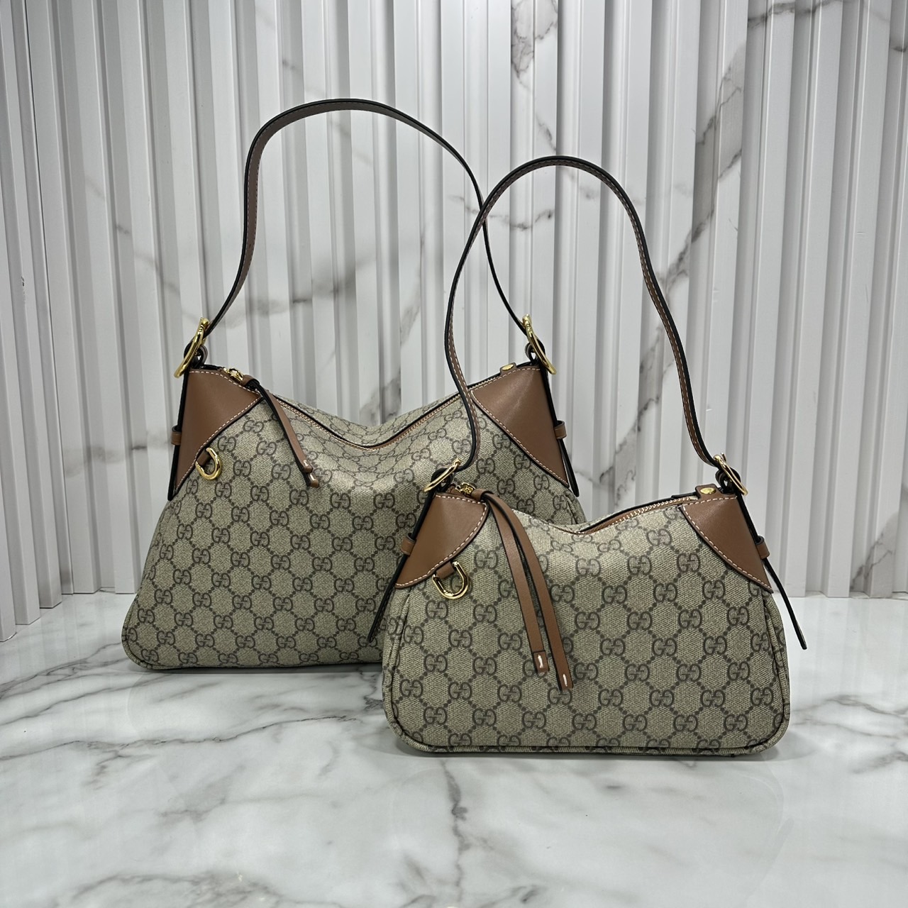 GUCCI GG Emblem medium shoulder bag กระเป๋าสะพายทรงใหม่สวยคลาสสิค พิมพ์ลายคมชัด เป็นไอเท็มต้องมีและยกเป็น everyday bag ได้เลย