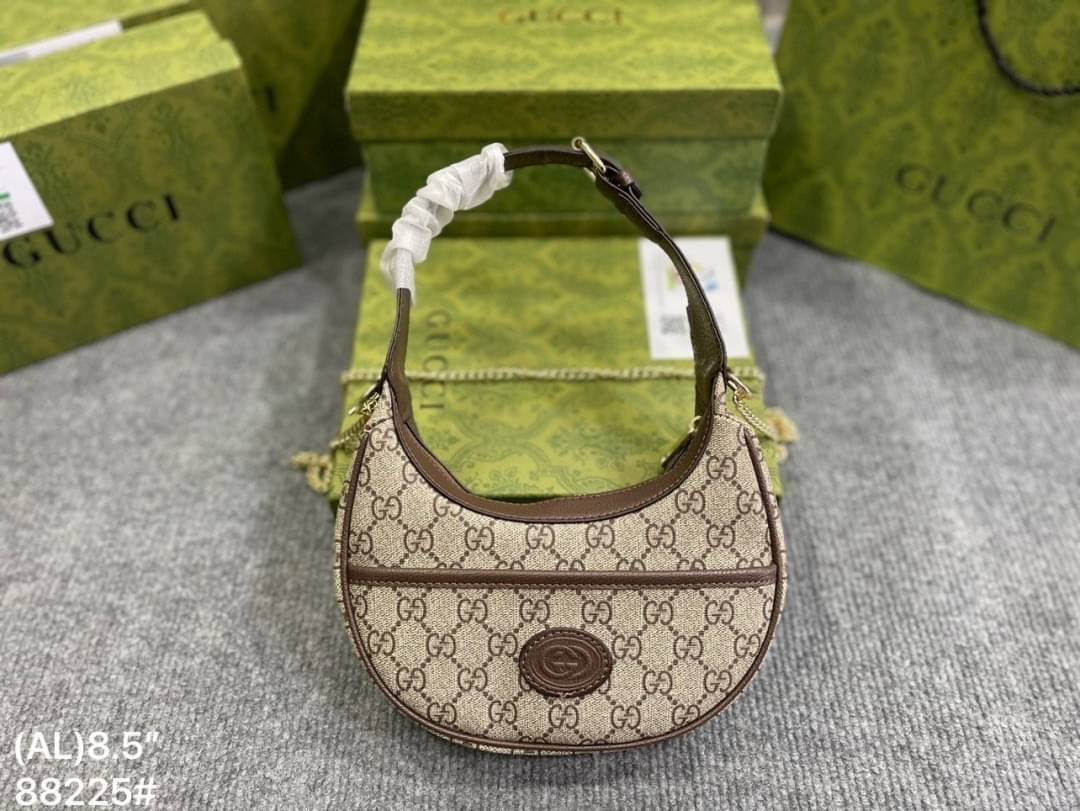 GUCCI half-moon Ophidia mini shoulder bag กระเป๋าสะพายไหล่รูปทรงพระจันทร์เสี้ยว Canvas GG Supreme กระเป๋าขนาดมินิให้ความรู้สึกย้อนยุคอันโดดเด่น สไตส์วินเทจ