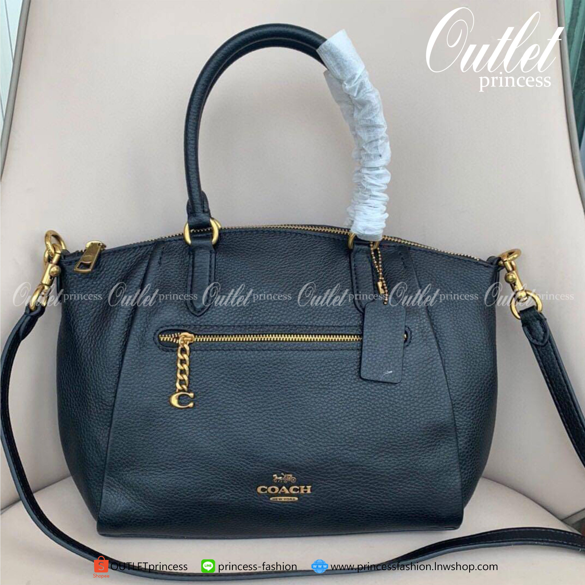 Coach Elise Satchel Polished pebble leather Inside zip and snap pockets Zip-top closure, fabric lining Handles