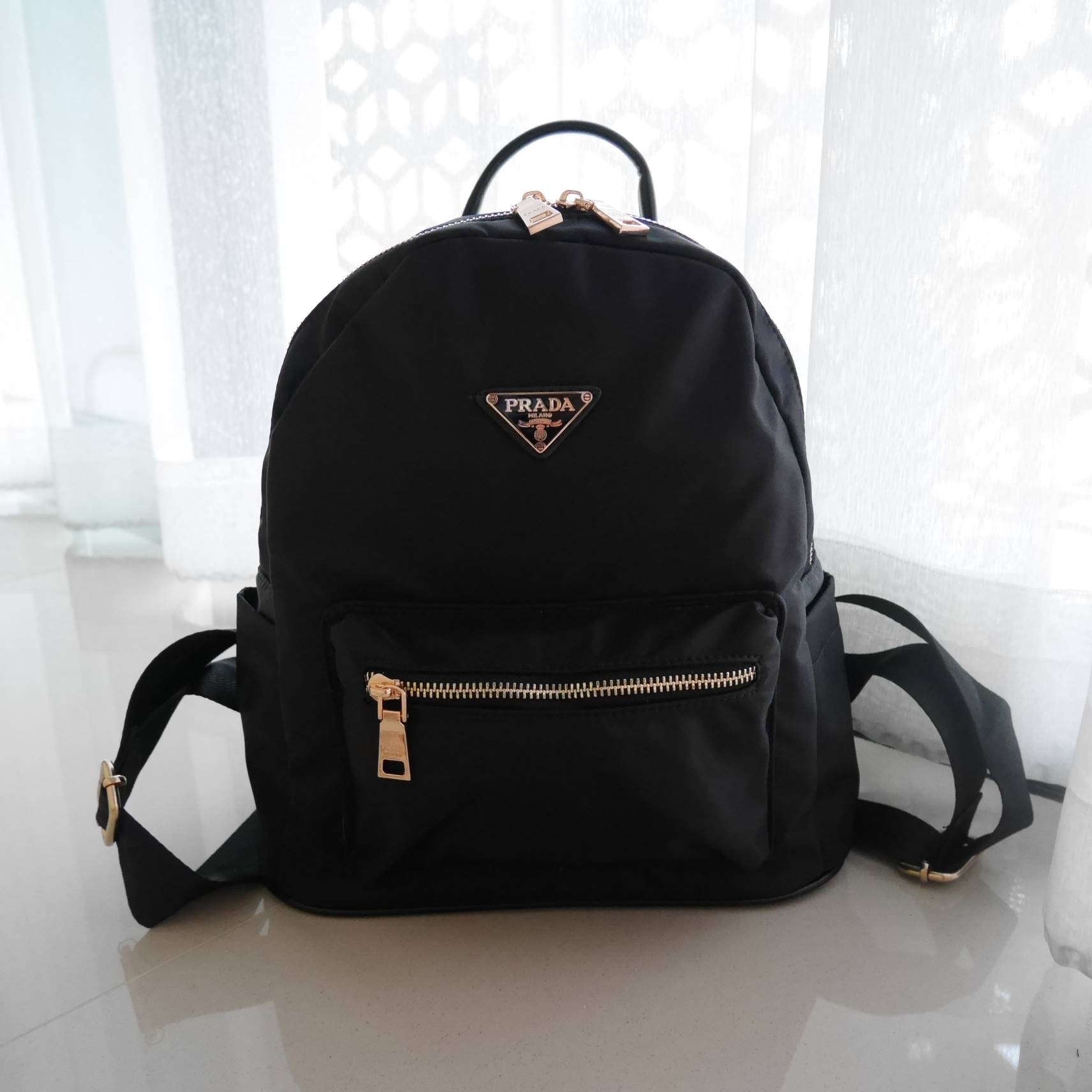งานพรีเมี่ยมกิ้ฟ จากเคาเตอร์ต่างประเทศนะคะ 🎈 Don't Miss! รุ่นใหม่ล่าสุด PRADA NYLON MINI BACKPACK กระเป๋าสะพายเป้ Size mini พรีเมี่ยมกิ้ฟจากเคาน์เตอร์ต่างประเทศรุ่น Limited edition ที่ฮ๊อตสุดๆ วัสดุเป็น Nylon เนื้อหนาคุณภาพดีตขนาดกะทัดรัดกำลั