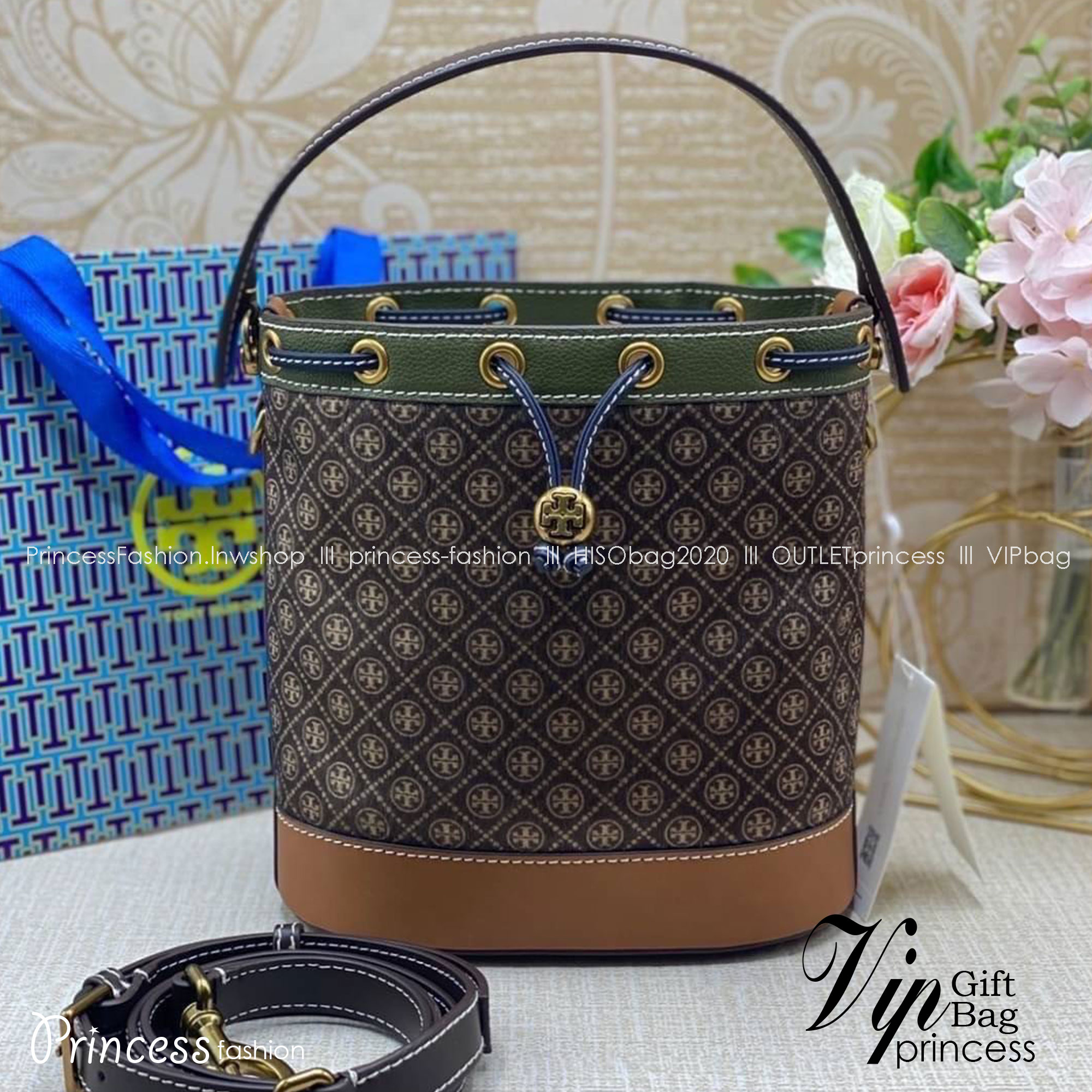 TORY BURCH T Monogram Calf Hair Bucket Bag MEDIUM ไอเท็มใหม่ที่ใครๆก็รอ กระเป๋าบัคเก็ตทรงสวย ที่ยังคงให้ความโดดเด่นด้วยลวดลายเอกลักษณ์ เพิ่มเติมดีไซน์บล็อคสี ตัดกันได้อย่างลงตัว
