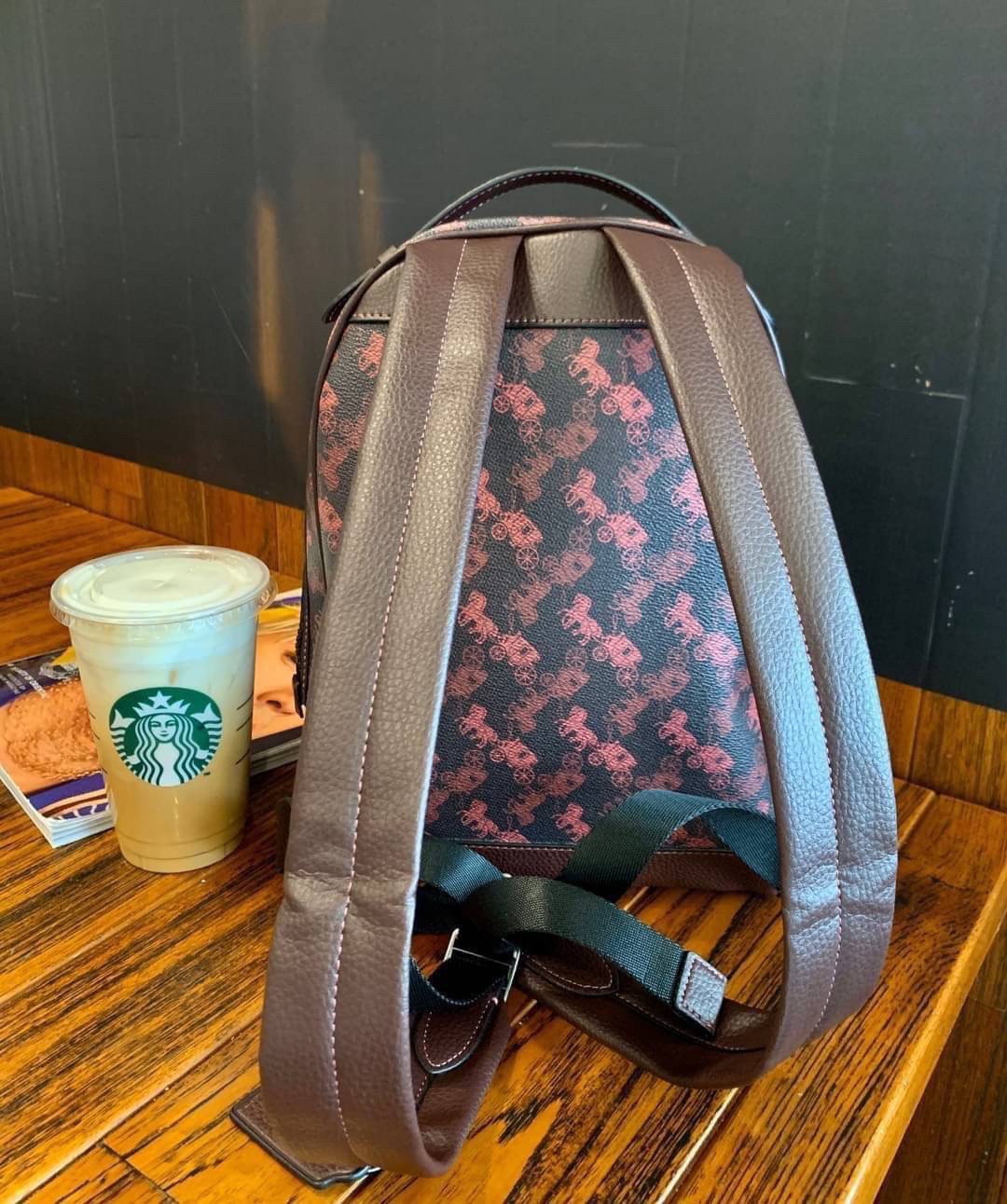 COACH BACKPACK WITH HORSE AND CARRIAGE PRINT AND HEARTS