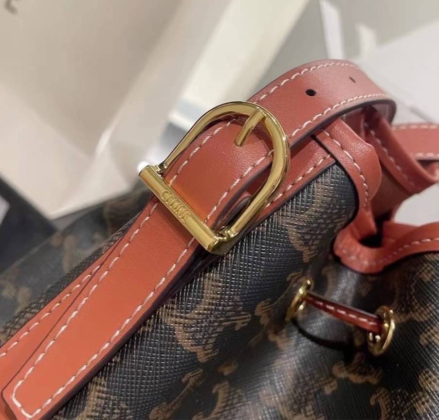 CELINE MEDIUM DRAWSTRING BAG IN TRIOMPHE CANVAS TAN