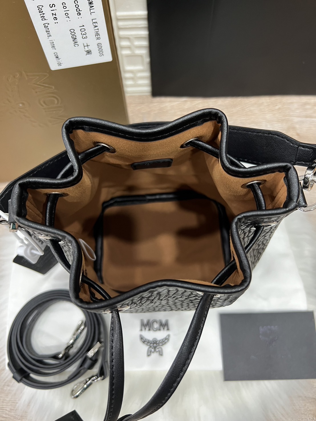 M.C.M MINI DESSAU DRAWSTRING BAG IN VISETOS กระเป๋าสะพายทรง bucket ไซส์ mini เกรดออริ สลับแท้ 1:1 ใช้งานต่างประเทศได้