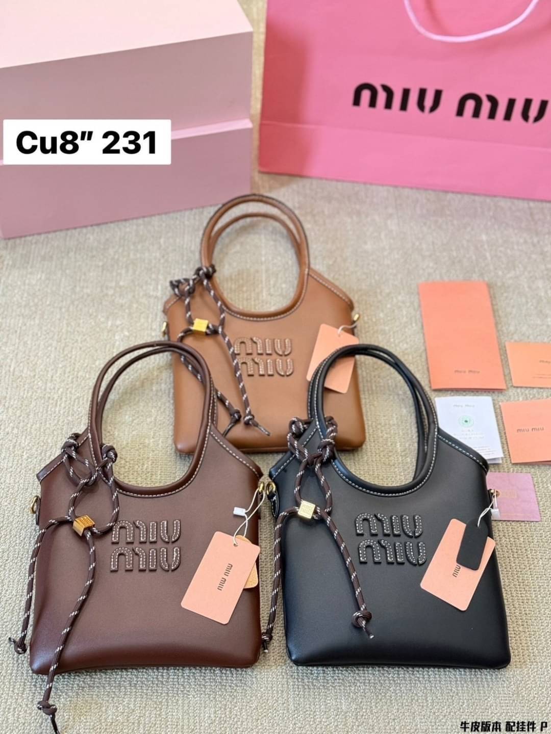 MIU MIU IVY leather handbag กระเป๋าถือทรงโท้ทงานหนังเรียบเต็มใบ ไซส์มินิมีความยูนิค พร้อมเชือกสุดคิ้ว ภายในเป็นช่องโล่ง ใส่ของสำคัญได้ พกพาไปไหนก็ได้