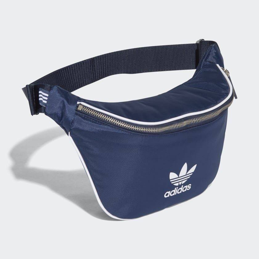 ADIDAS ORIGINALS ADICOLOR WAIST BAG ของมันต้องมี!! กระเป๋าคาดอก/คาดเอวสุดชิค ดีไซน์เรียบง่าย แต่สะพายแล้วเท่ คลาสสิคสุดๆ!! วัสดุ Nylon+Polyester กันน้ำได้ เปิด-ปิดฝากระเป๋าด้วยซิป หัวซิปปั๊มแบรนด์เป็น signature ภายในมีช่องโล่งกว้าง ใส่ของได้พอสมควร ใส่มือ