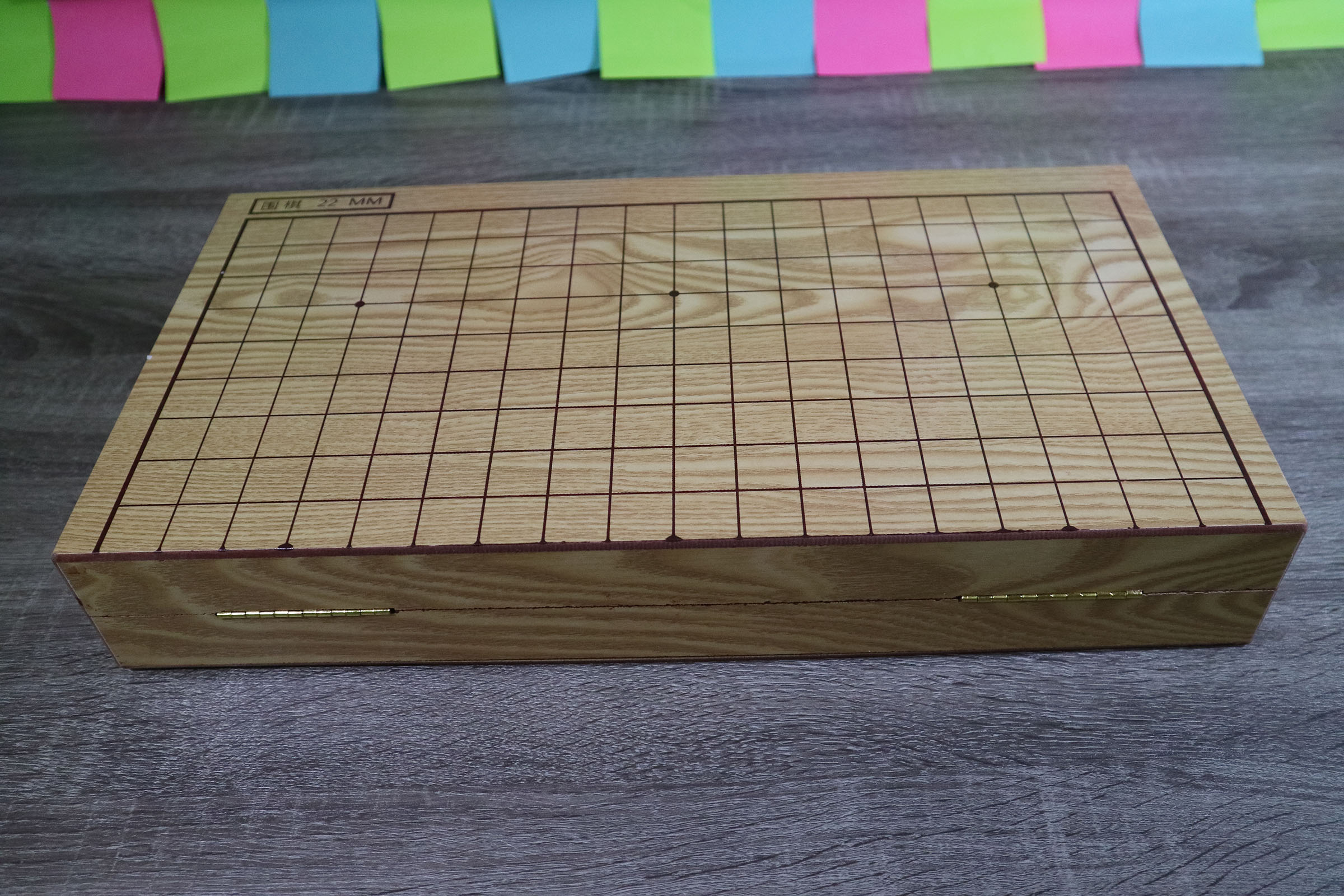 ชุดหมากล้อมพับได้สีครีมเนื้อพร้อมเม็ดหมากพลาสติกนูนสองด้าน