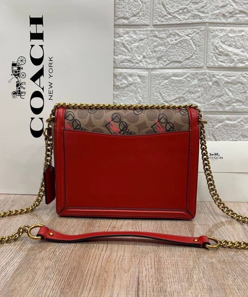 COACH HUTTON SHOULDER BAG IN SIGNATURE CANVAS