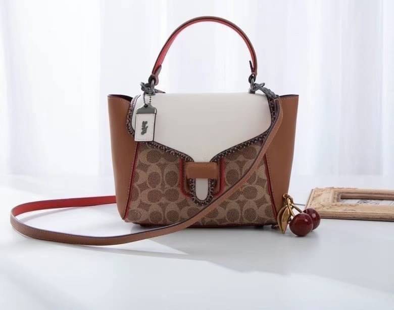 COACH COURIER CARRYALL 23 IN COLORBLOCK SIGNATURE CANVAS พร้อมส่ง 7 แบบ พร้อมส่ง ลุคดูไฮสุดๆค่ะ! กระเป๋าสะพายหนังหรูหราและคลาสสิค หนังแท้ชั้นดีที่สุด น้ำหนักเบา หนังสวยมากก สัมผัสแล้วหลงรักแน่นอนจ้าา😘