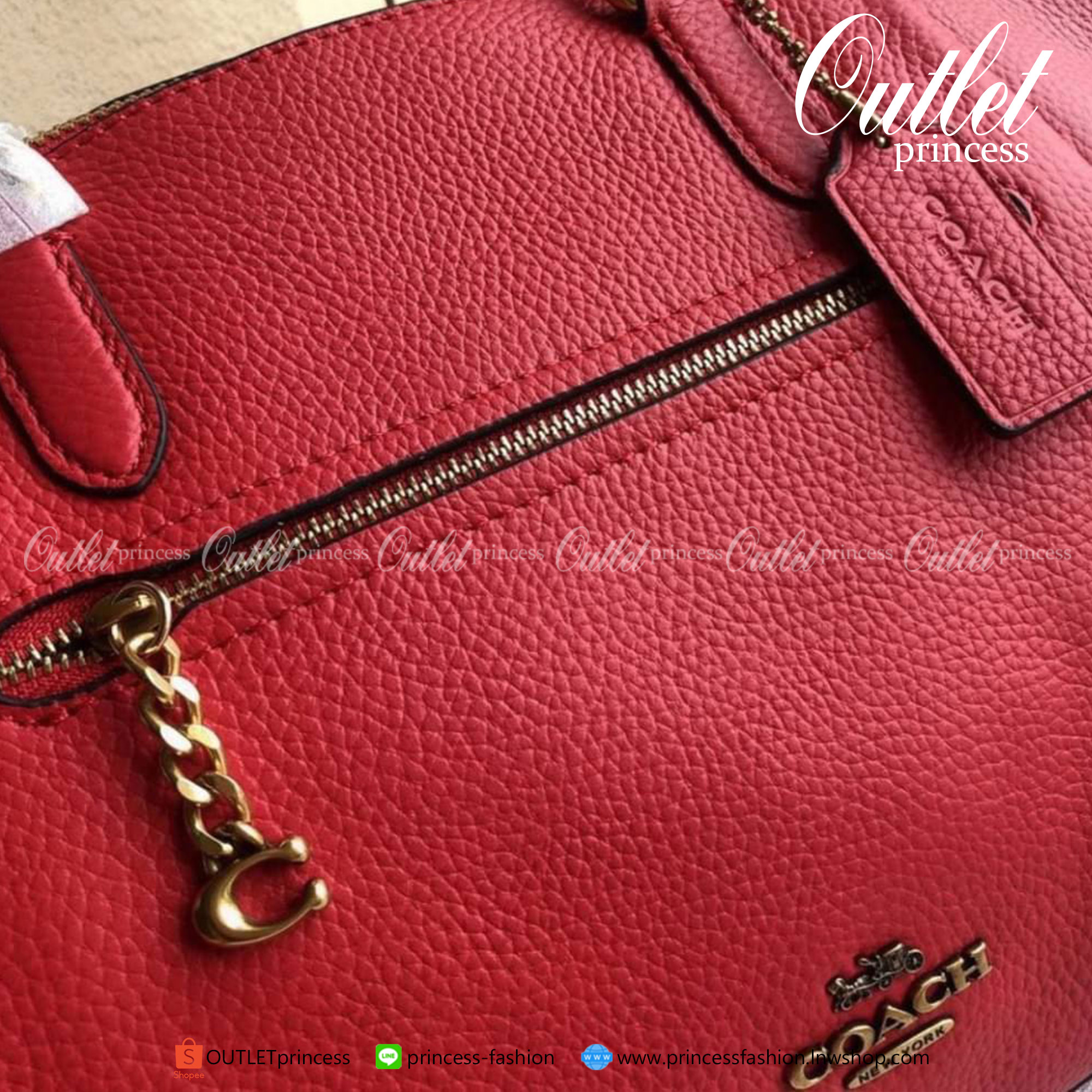 Coach Elise Satchel Polished pebble leather Inside zip and snap pockets Zip-top closure, fabric lining Handles
