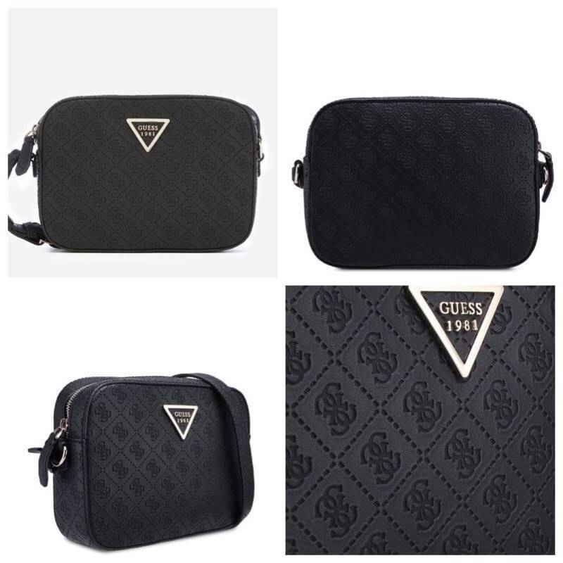 New Arrival!! Guess Women's Black Kamryn Top Zip Cross Body Bag กระเป๋าสะพายไหล่ ขนาดกำลังดี มีดีเทลที่มีโลโก้หนังปั้มจมรอบใบรวมถึงตัวสายและหัวซิป ตรงกลางติดสัญลักษณ์แบรนด์ เปิดใช้งานด้วยซิปเดียวด้านบน ภายในใส่กระเป๋าสตางค์ยาวได้ มีช่องเสียบการด์และช