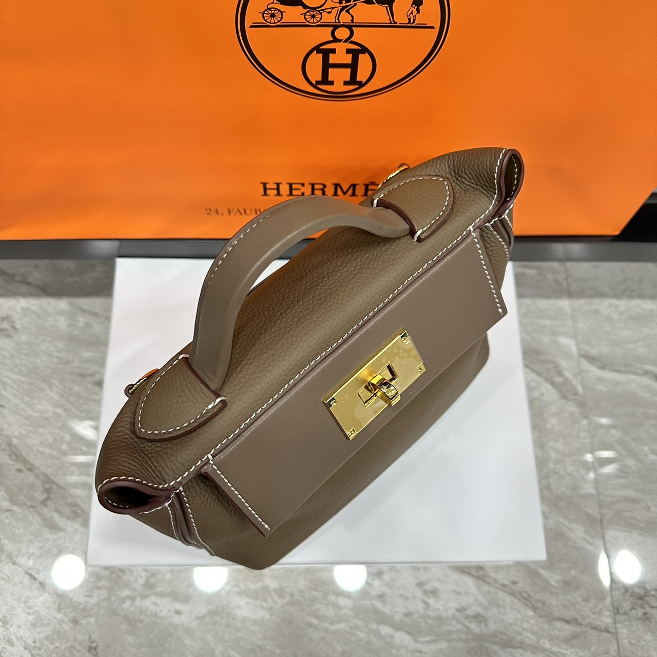 HERMES Hermes 24/24 Mini bag 20cm กระเป๋าถือ/สะพายแบรนด์หรู เอกลักษณ์ของความสง่างาม เกรดออริ สลับแท้ 1:1 ใช้งานต่างประเทศได้