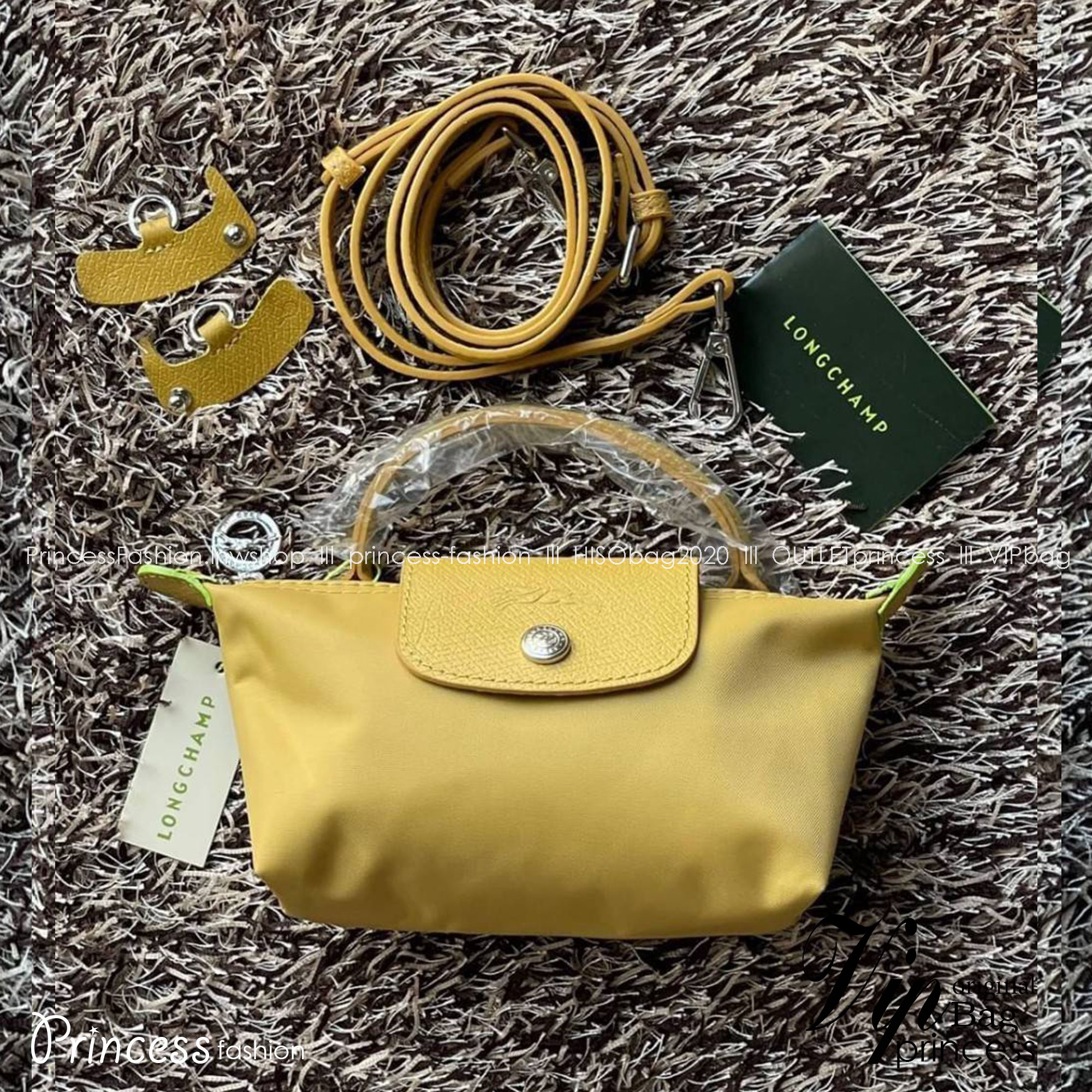 LONGCHAMP LE PLIAGE ORIGINAL Pouch with handle กระเป๋าถือขนาดมินิทรงpouch ให้ความหรูหราจาก Le Pliage (เลอ ปลิยาจ) ในขณะที่ที่ปิดแบบซิปช่วยให้คุณมั่นใจได้