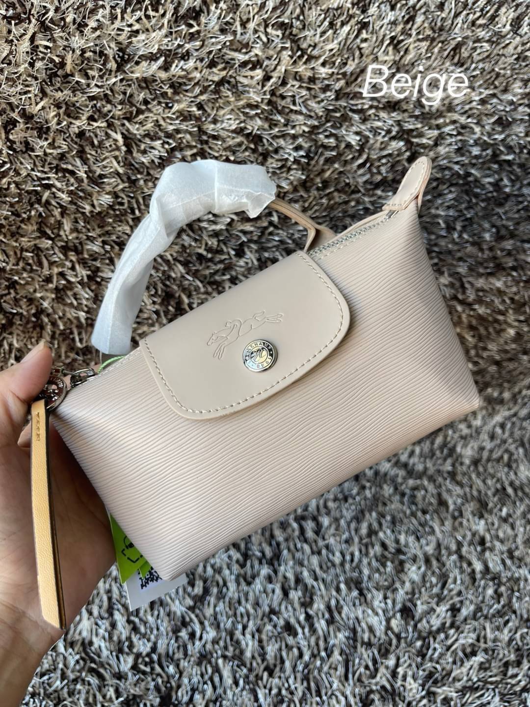 LONGCHAMP LE PLIAGE CITY POUCH WITH HANDLE Taupe - Canvas (ไม่มีสายยาว) กระเป๋าเครื่องสำอางแบบมีซิปพร้อมหูหิ้วใบนี้เหมาะสำหรับการจัดระเบียบกระเป๋าของคุณ