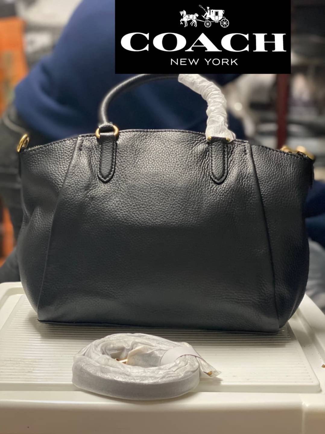 Coach Elise Satchel Polished pebble leather Inside zip and snap pockets Zip-top closure, fabric lining Handles