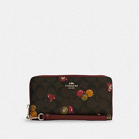 COACH C7410 LONG ZIP AROUND WALLET WITH ORNAMENT PRINT ความสวยต้องส่งต่อ!! คอลเลคชั่นใหม่ 2IN1 คุ้มค่าแบบที่สุด กระเป๋าสตางค์กึ่งคล้องมือ ดีไซน์ลวดลายสดใส น่ารักน่าใช้ คลาสสิคใช้ง่าย ไม่มีเบื่อ วัสดุหนังแคนวาสเคลือบลาย มาพร้อมสายคล้องมือ ถอดออกได้ ภายในใส