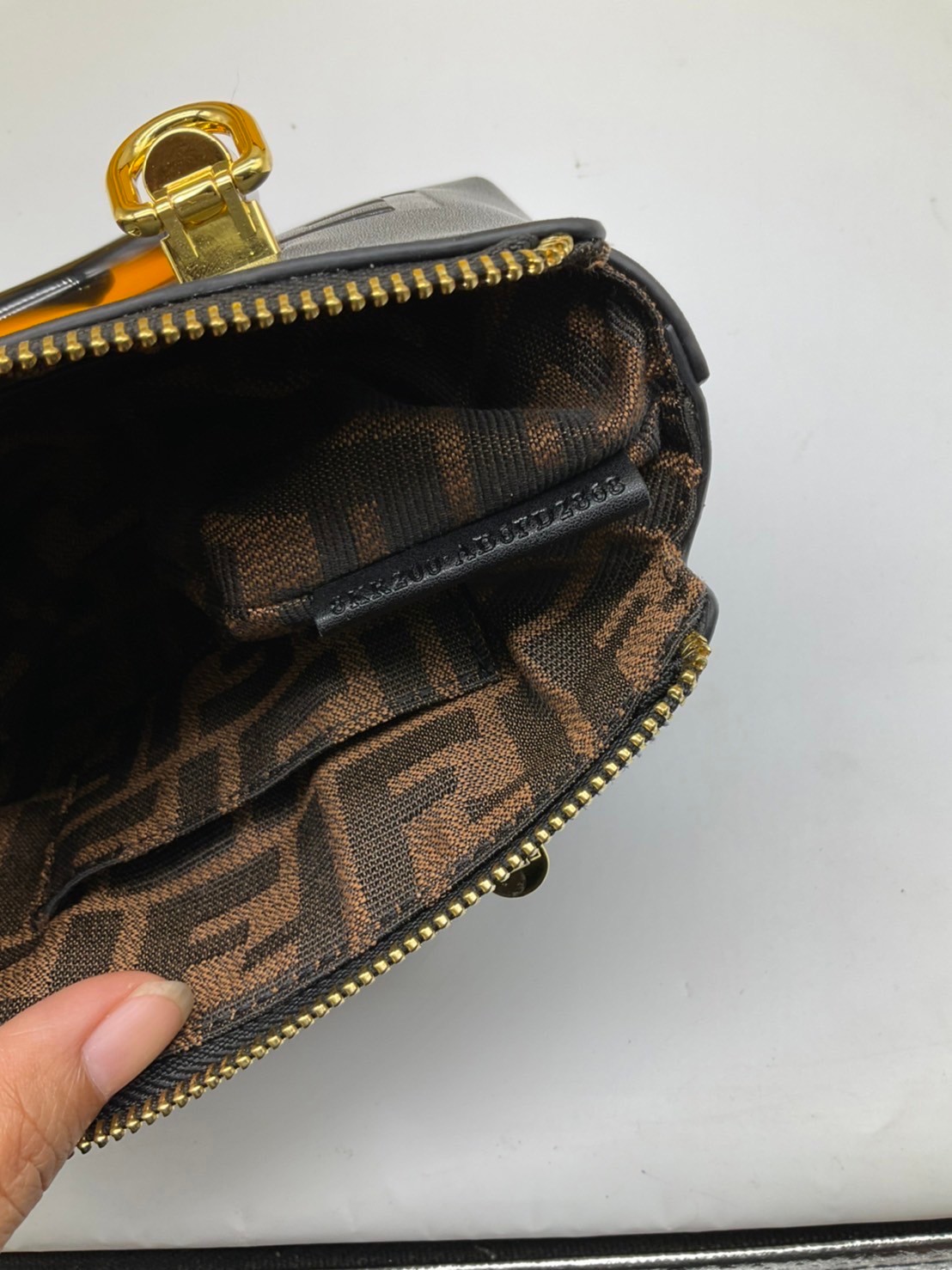 FENDI By The Way Mini Bag พร้อมส่งที่ไทย ภาพถ่ายจากงานขายจริง Iconic mini By The Way Boston bag made FENDI ROMA lettering and rigid tortoiseshell-effect plexiglass handles.