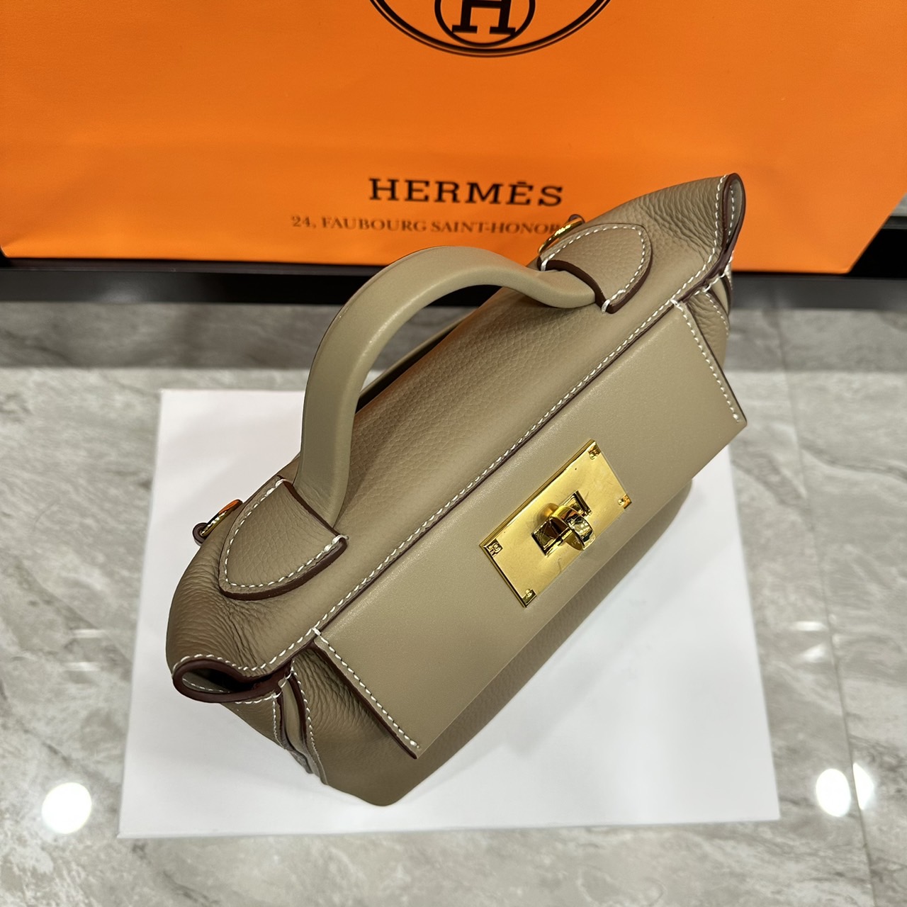 HERMES Hermes 24/24 Mini bag 20cm กระเป๋าถือ/สะพายแบรนด์หรู เอกลักษณ์ของความสง่างาม เกรดออริ สลับแท้ 1:1 ใช้งานต่างประเทศได้