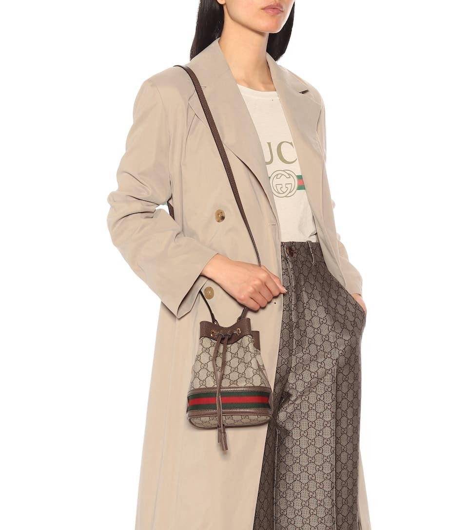 GUCCI Ophidia mini small GG bucket bag กระเป๋าถือหรือสะพายข้าง ขนาดเล็ก ทรงขนมจีบ วัสดุผ้าใบ+หนังแท้ พร้อมแถบลายทางสีเขียวและสีแดงด้านล่าง ด้านในโล่ง มี1ช่องเล็ก สายยาวถอดสายไม่ได้ ปรับระดับได้ ใบนี้เรียบหรูดูดีสุดๆไม่ควรพลาดค่า