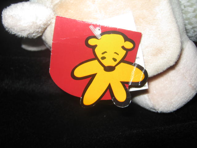 ตุ๊กตาวัวใส่เอี๊ยมสีแดง ตัวอ้วน นุ่มมากค่ะ ยังมีป้ายห้อยอยู่เลยค่ะ (ตุ๊กตามือสองสภาพใหม่ค่ะ )