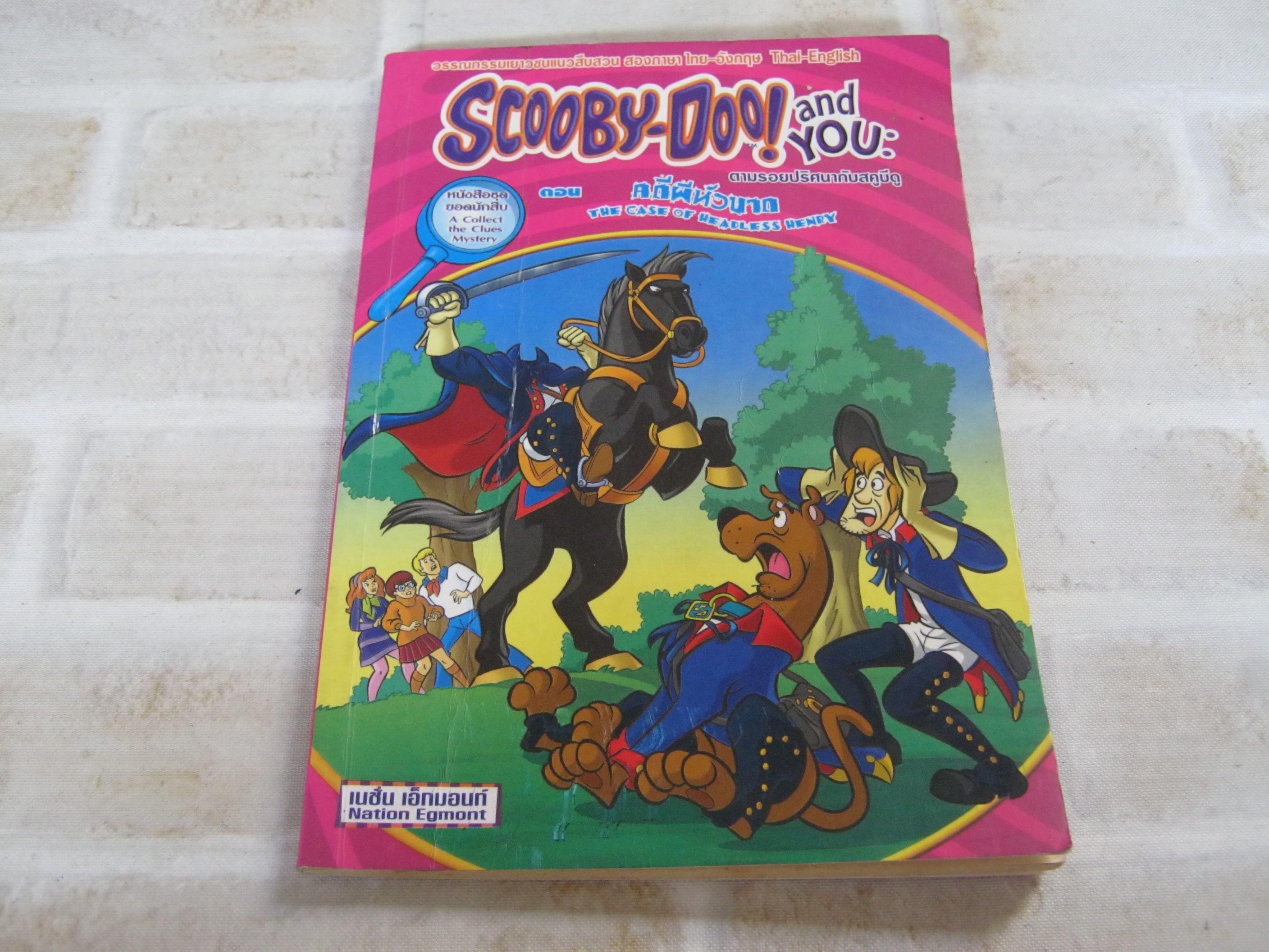 ตามรอยปริศนากับสคูบีดู ตอน คดีผีหัวขาด (Scooby-Doo! and You The Case of Headless Henry) ฉบับสองภาษา ไทย-อังกฤษ Jenny Markas เขียน อัมพร มิ่งเมืองไทย แปล***สินค้าหมด***