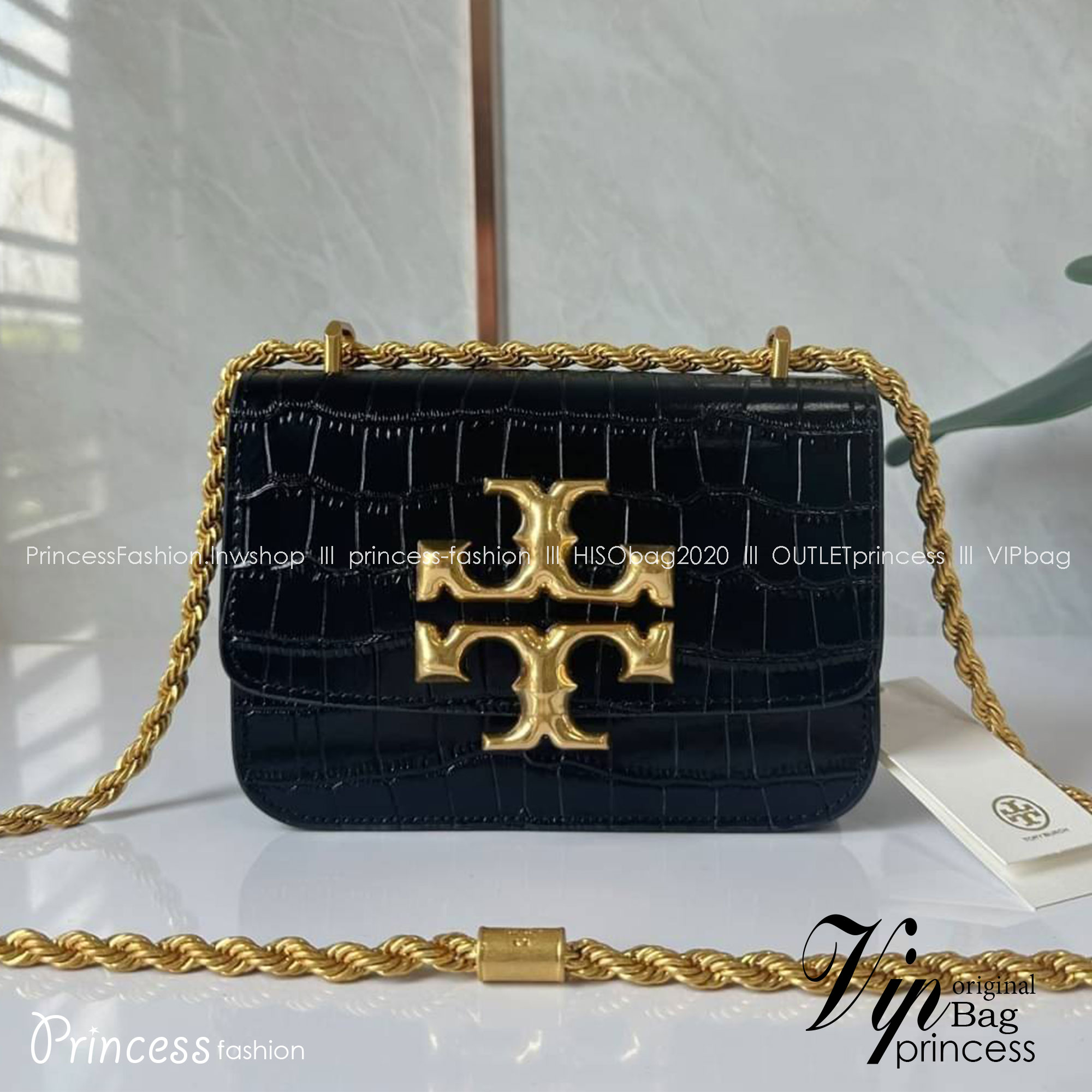 6 สี Tory Burch Croc Eleanor Small Bag / TORY BURCH ELEANOR CROC EMBOSSED LEATHER กระเป๋าสะพายหนังพิมพ์ลายจระเข้ ดีไซน์หรูหรา โด่นเด่นด้วยโลโก้แบรนด์อะไหล่ด้านหน้า และสายสะพายโลหะสีทอง